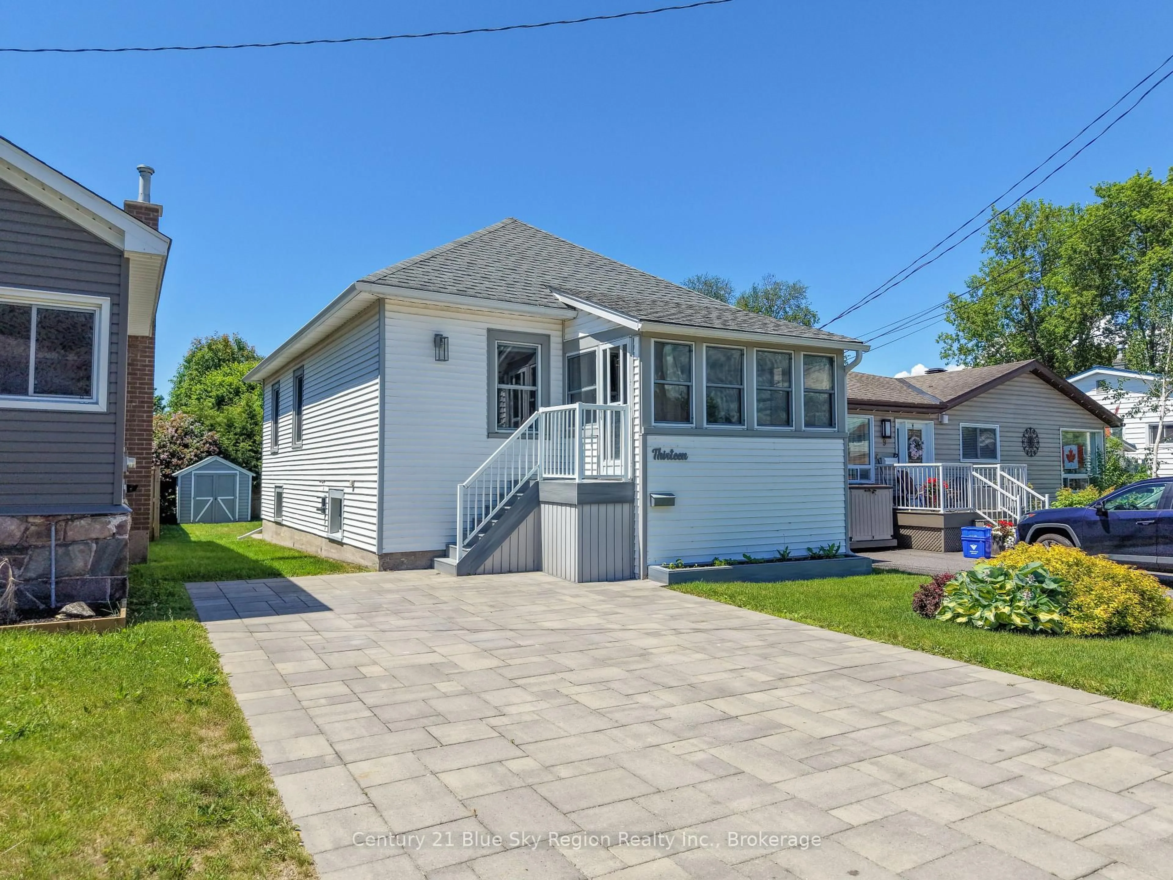 A pic from outside/outdoor area/front of a property/back of a property/a pic from drone, street for 13 Pollard Ave, North Bay Ontario P1A 1Z4
