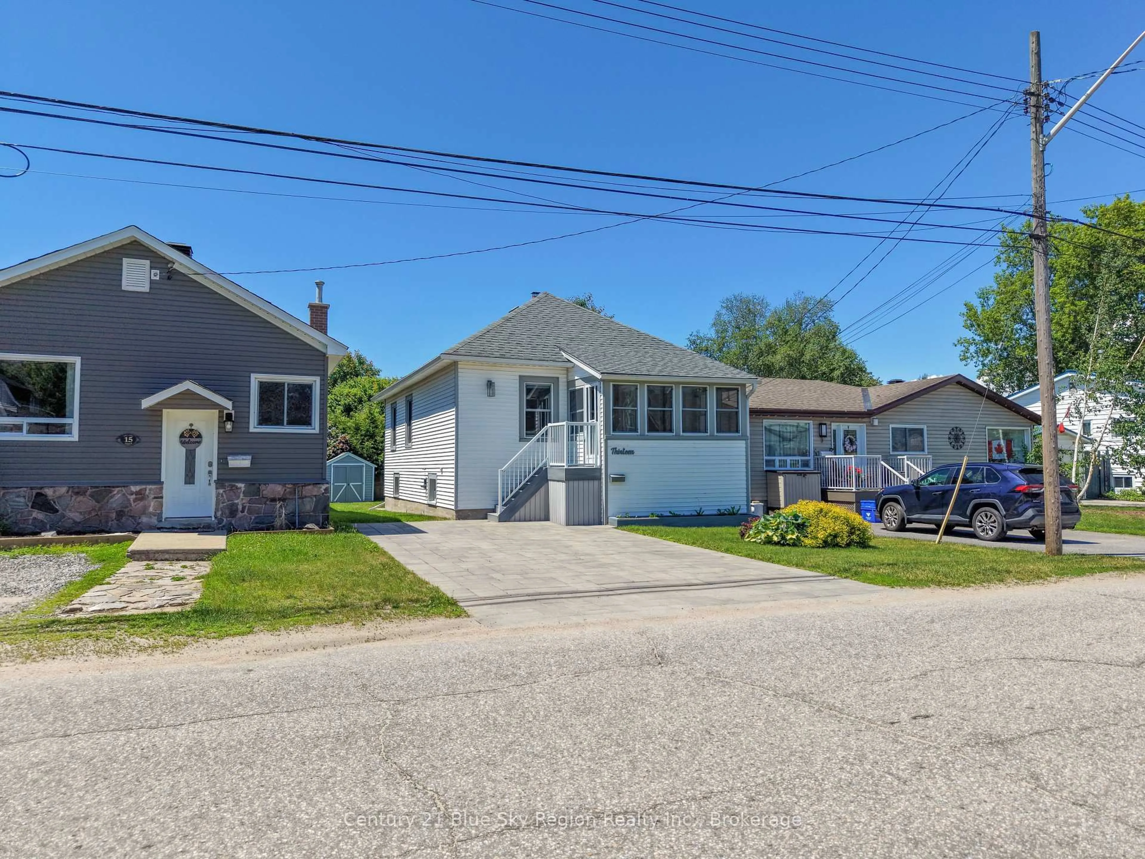 A pic from outside/outdoor area/front of a property/back of a property/a pic from drone, street for 13 Pollard Ave, North Bay Ontario P1A 1Z4