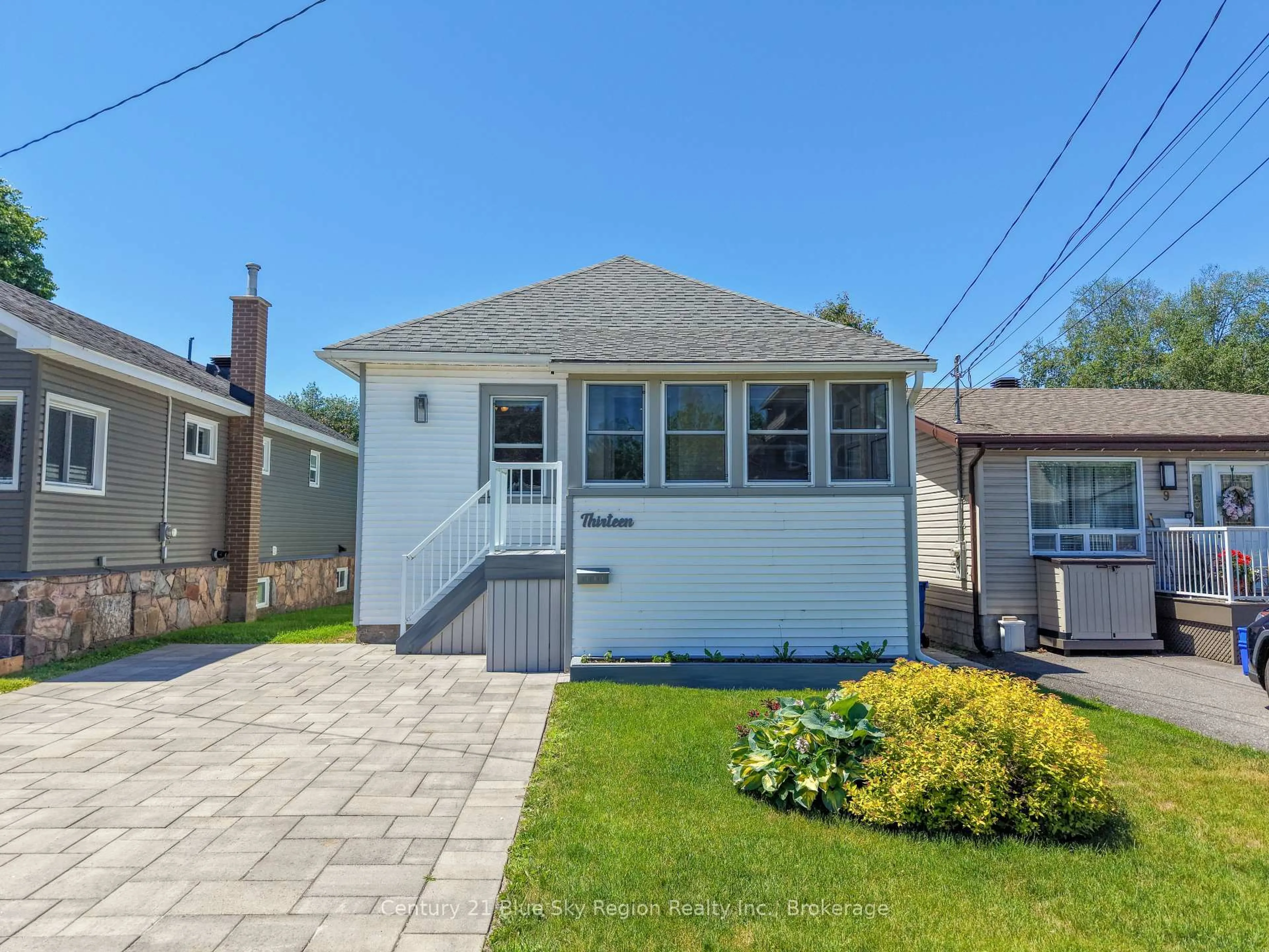 Home with vinyl exterior material, street for 13 Pollard Ave, North Bay Ontario P1A 1Z4