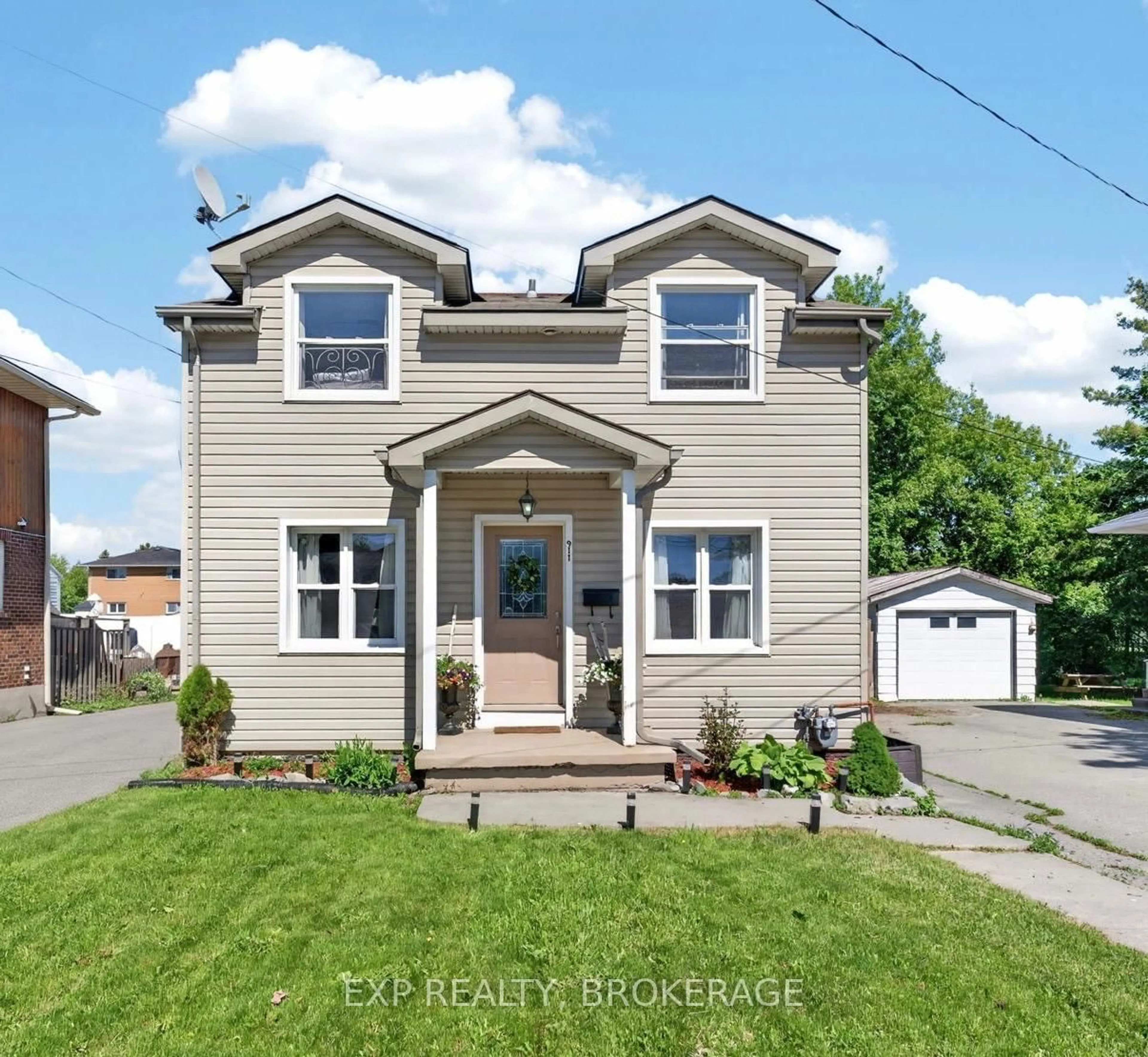 Home with brick exterior material, street for 911 Division St, Kingston Ontario K7K 4C6