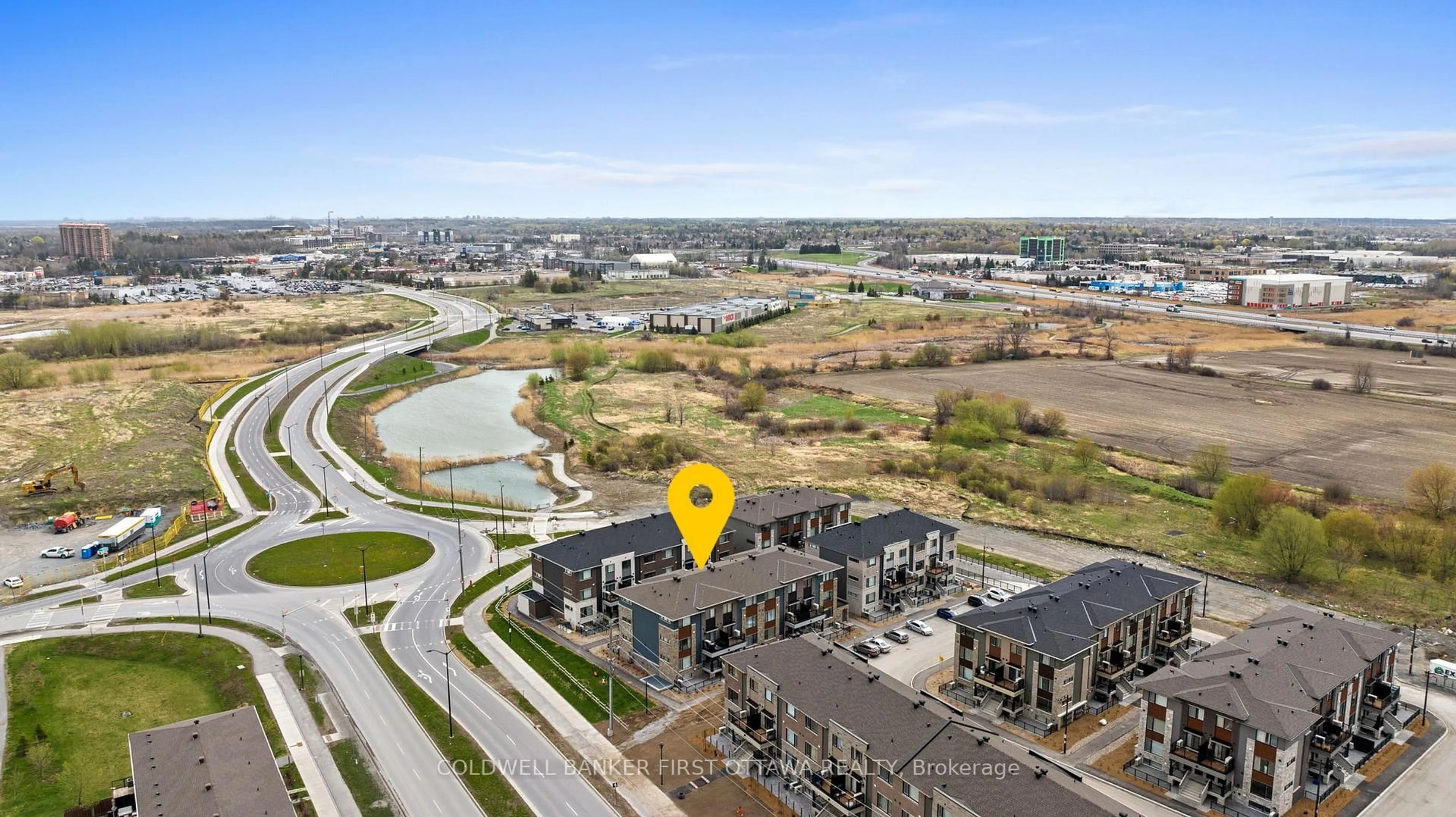 A pic from outside/outdoor area/front of a property/back of a property/a pic from drone, water/lake/river/ocean view for 1411 Creekway Private, Kanata Ontario K2T 0T1
