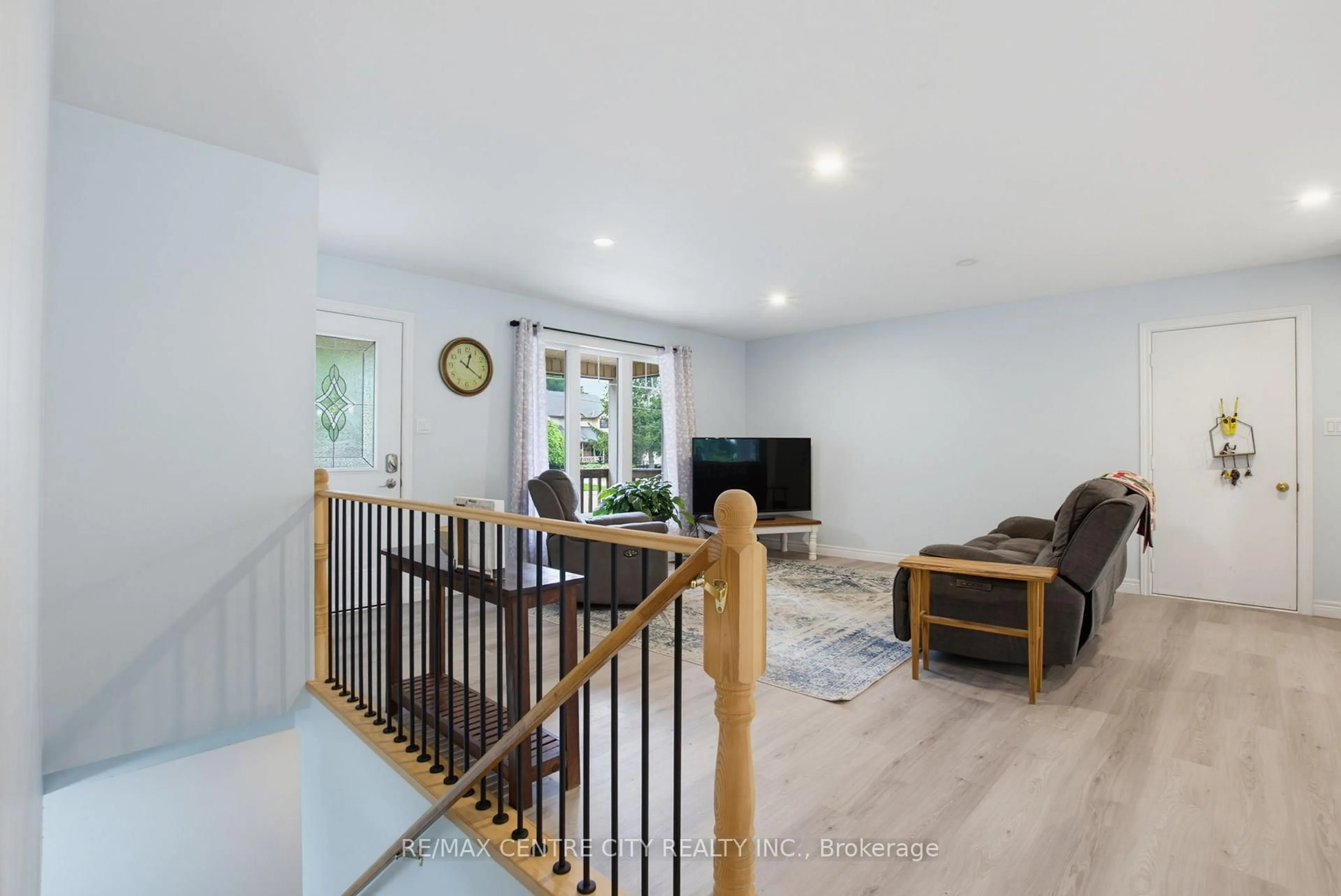 Living room with furniture, wood/laminate floor for 119 Anderson Ave, Southwest Middlesex Ontario N0L 1M0
