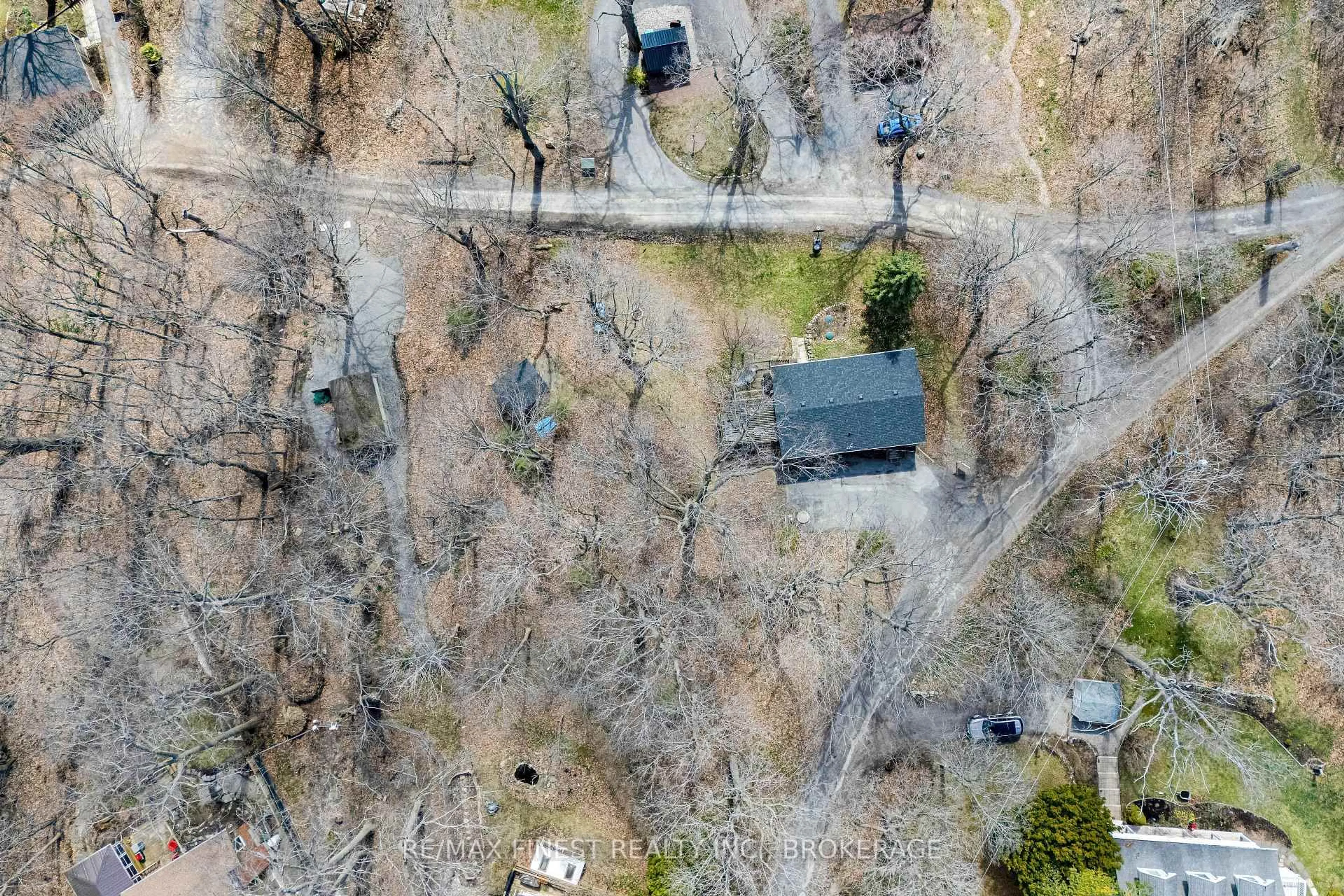 A pic from outside/outdoor area/front of a property/back of a property/a pic from drone, forest/trees view for 9 Mallard Lane, Kingston Ontario K7K 5E2