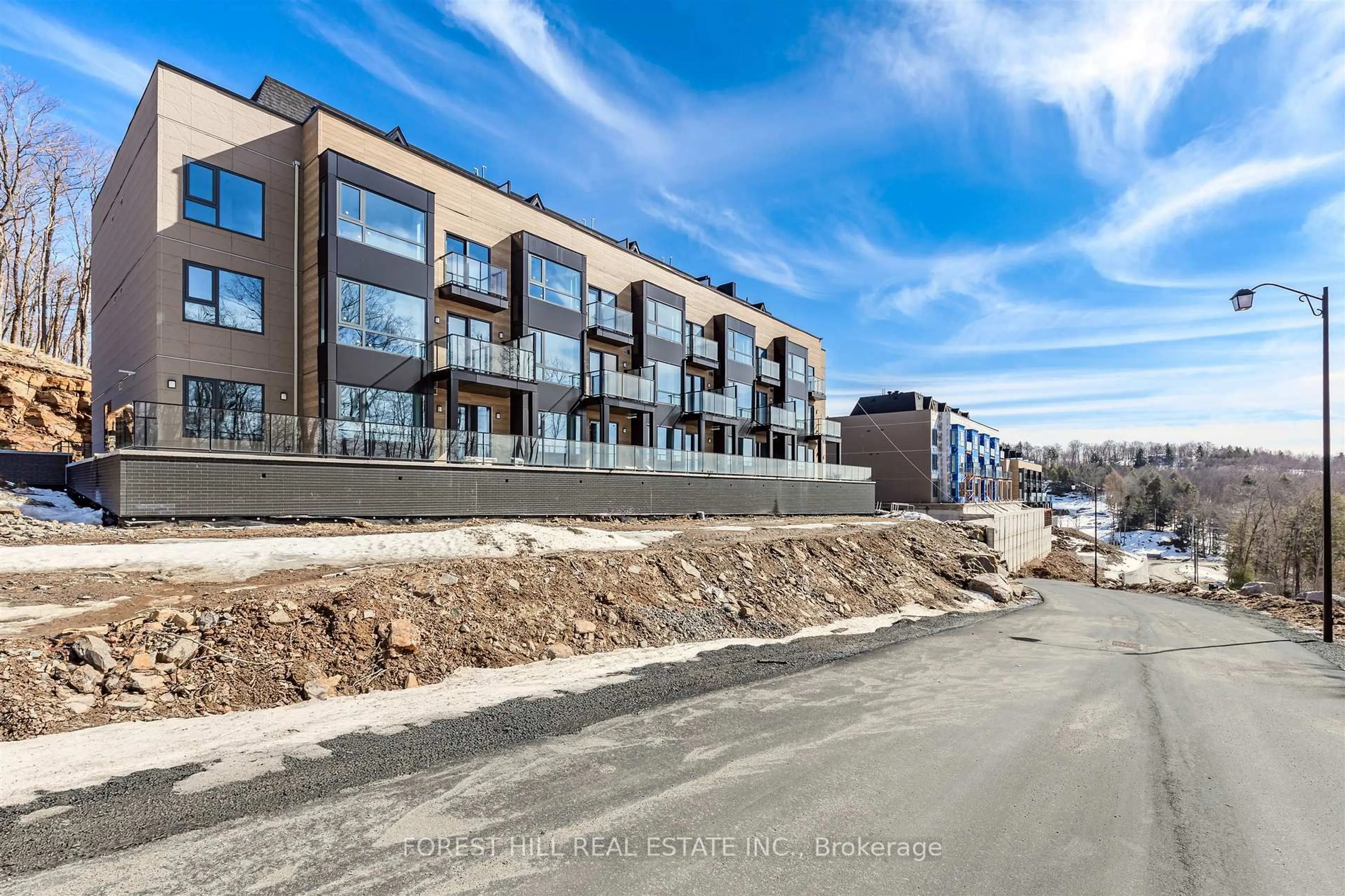 A pic from outside/outdoor area/front of a property/back of a property/a pic from drone, unknown for 119 Town Line Rd #H111, Huntsville Ontario P1H 1S7