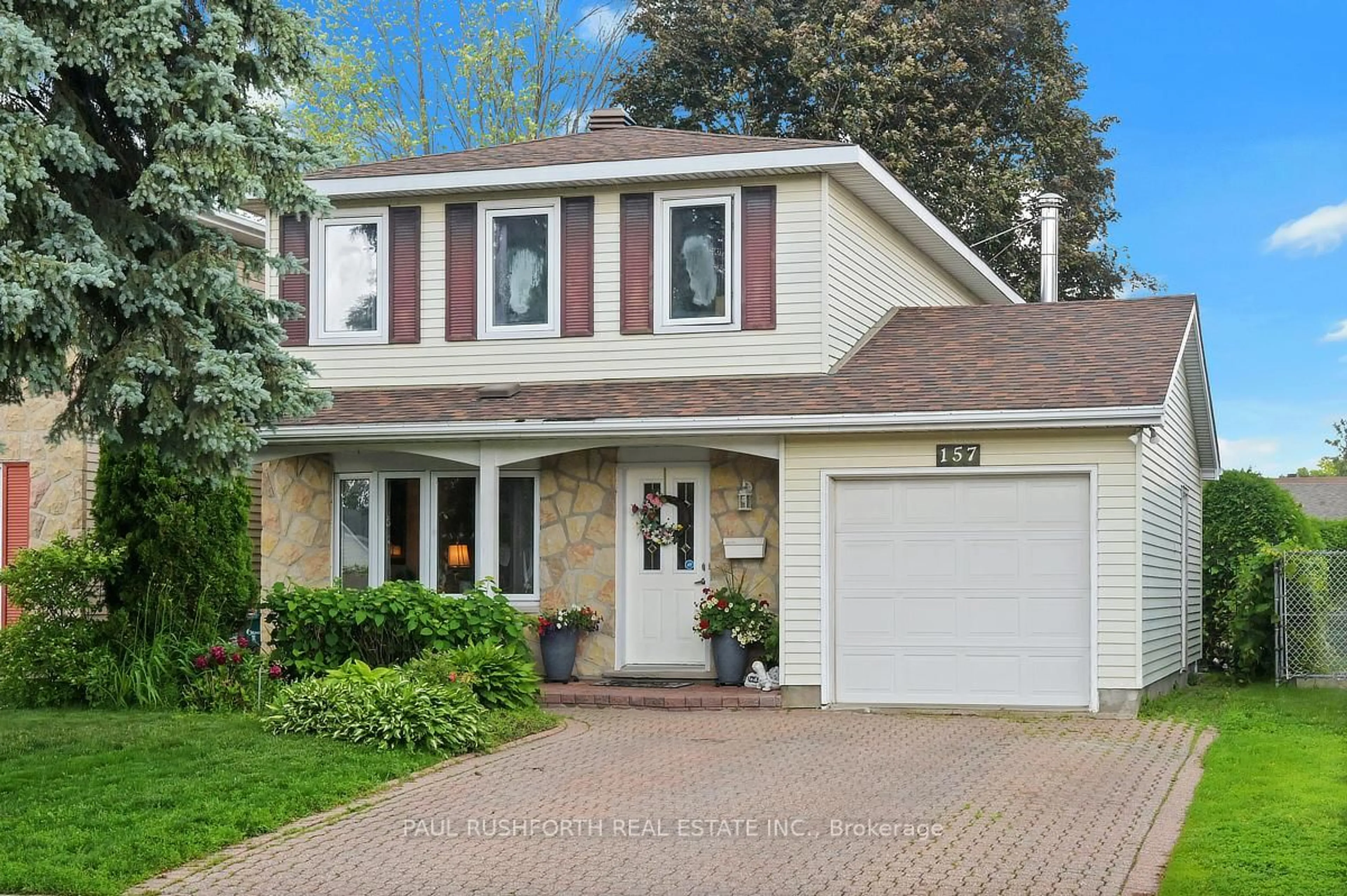 Home with brick exterior material, street for 157 Craig Henry Dr, Ottawa Ontario K2G 3Z8