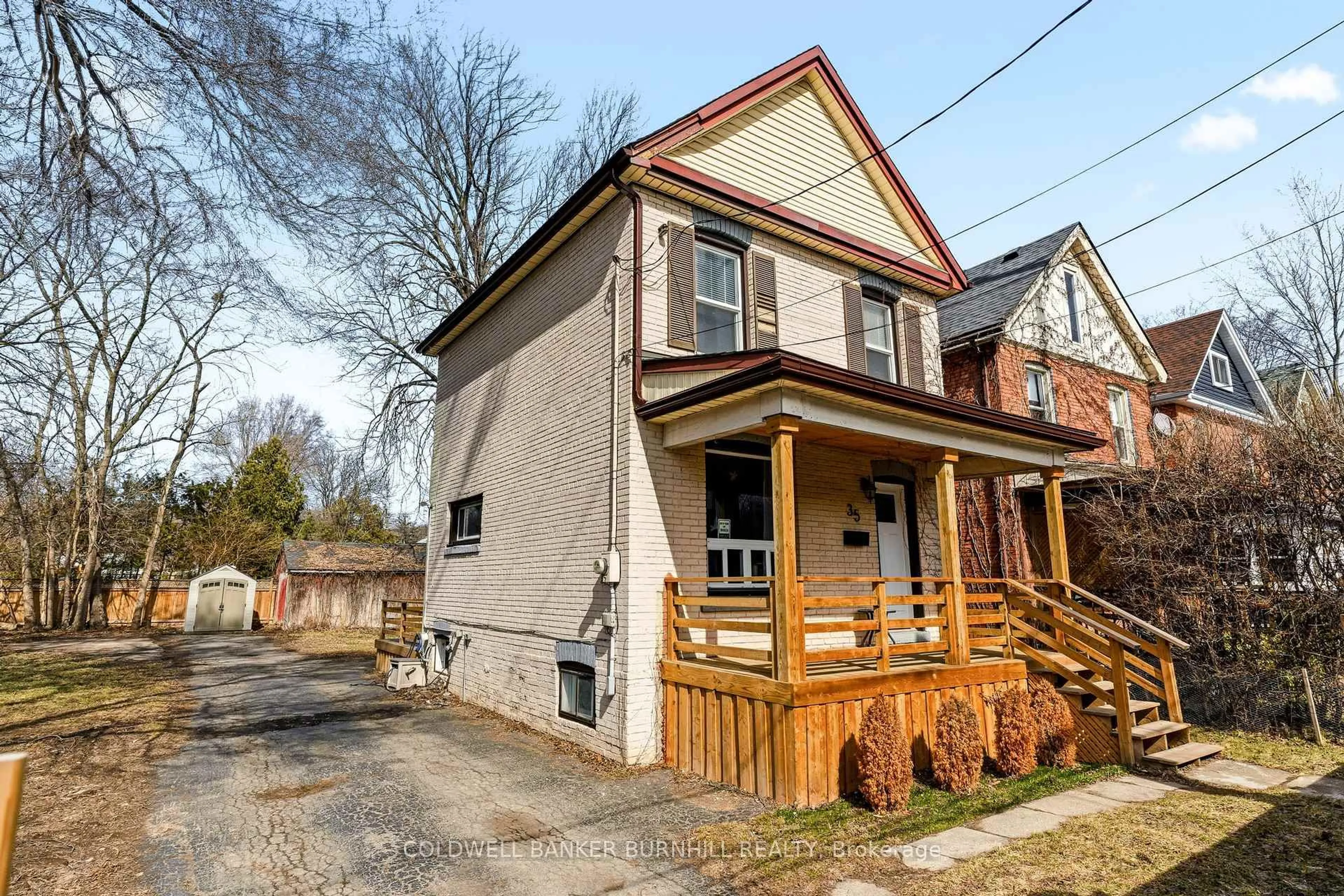 Home with brick exterior material, street for 35 Dundas St, Hamilton Ontario L9H 1A1