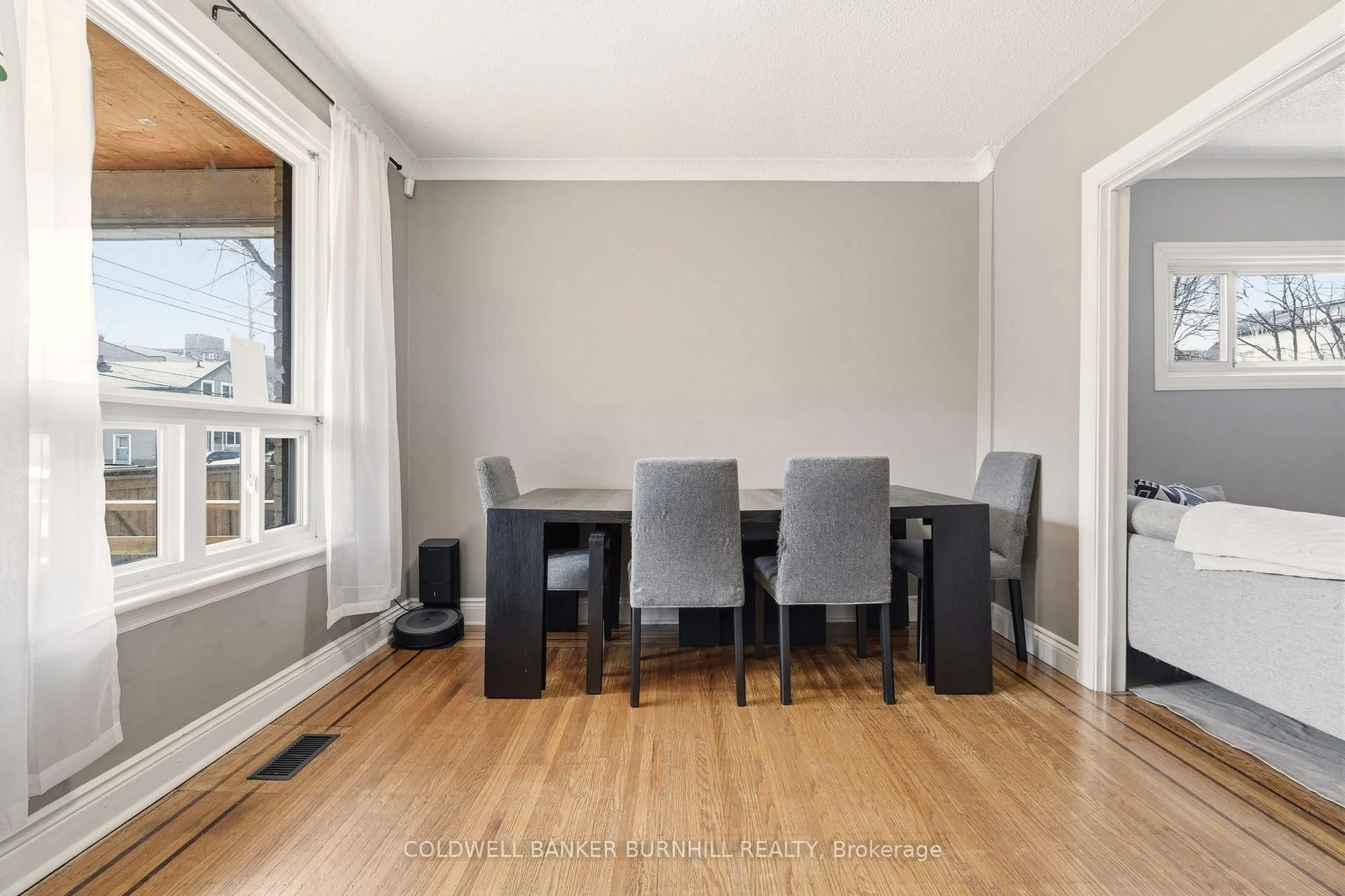 Dining room, wood/laminate floor for 35 Dundas St, Hamilton Ontario L9H 1A1