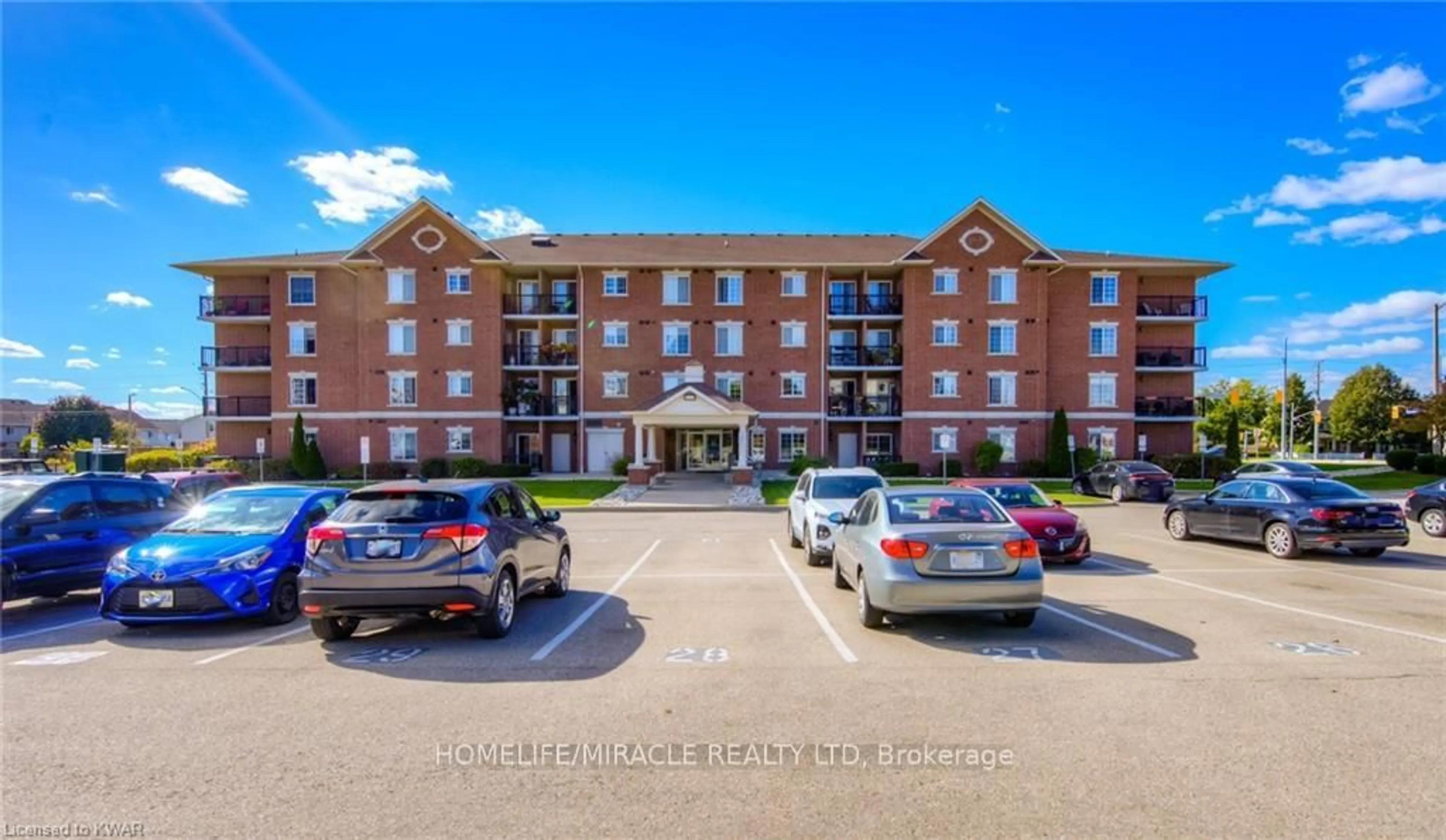 A pic from outside/outdoor area/front of a property/back of a property/a pic from drone, unknown for 415 Grange Rd #101, Guelph Ontario N1E 0C4