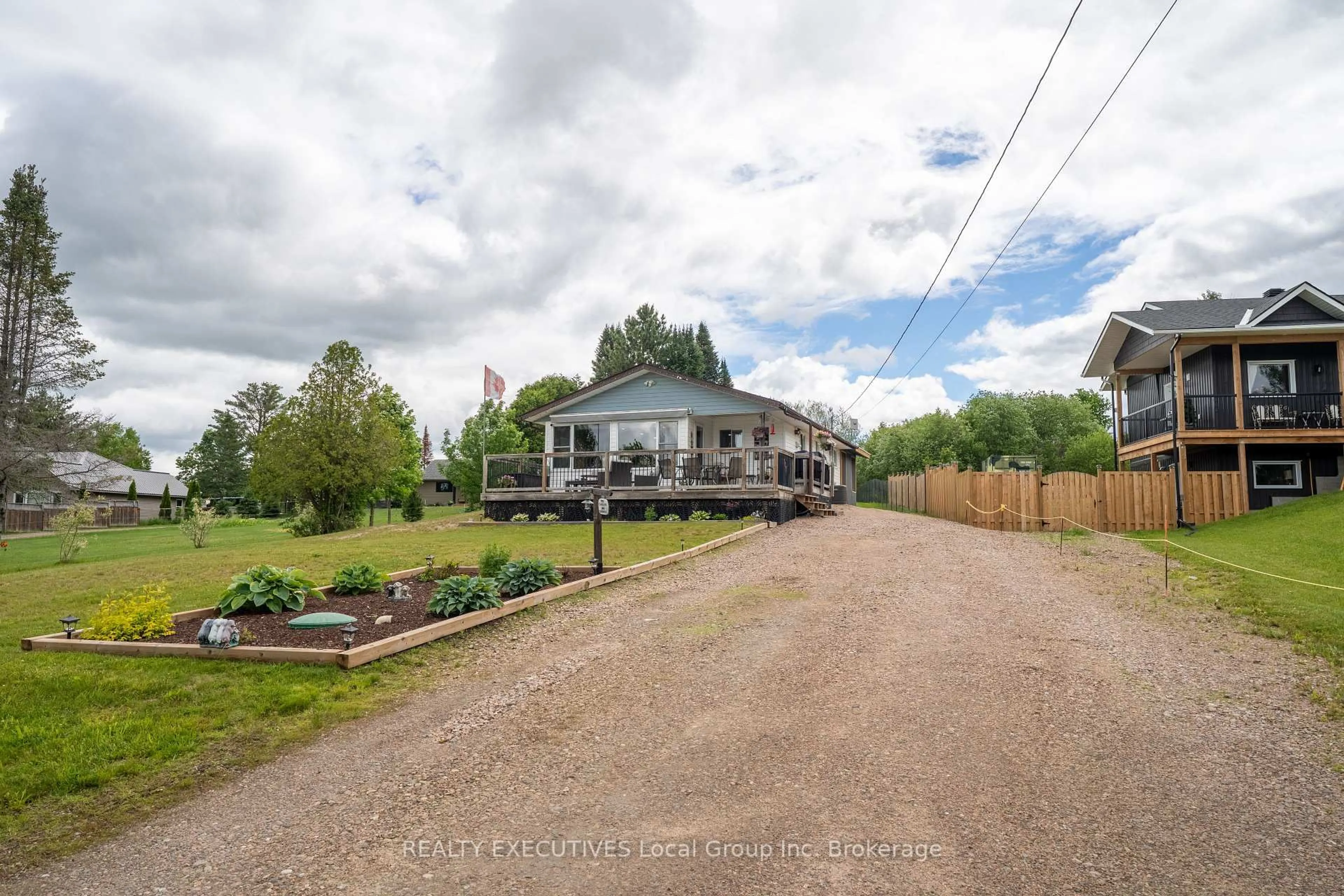 A pic from outside/outdoor area/front of a property/back of a property/a pic from drone, street for 44 Lakeshore Rd, Bonfield Ontario P0H 1E0