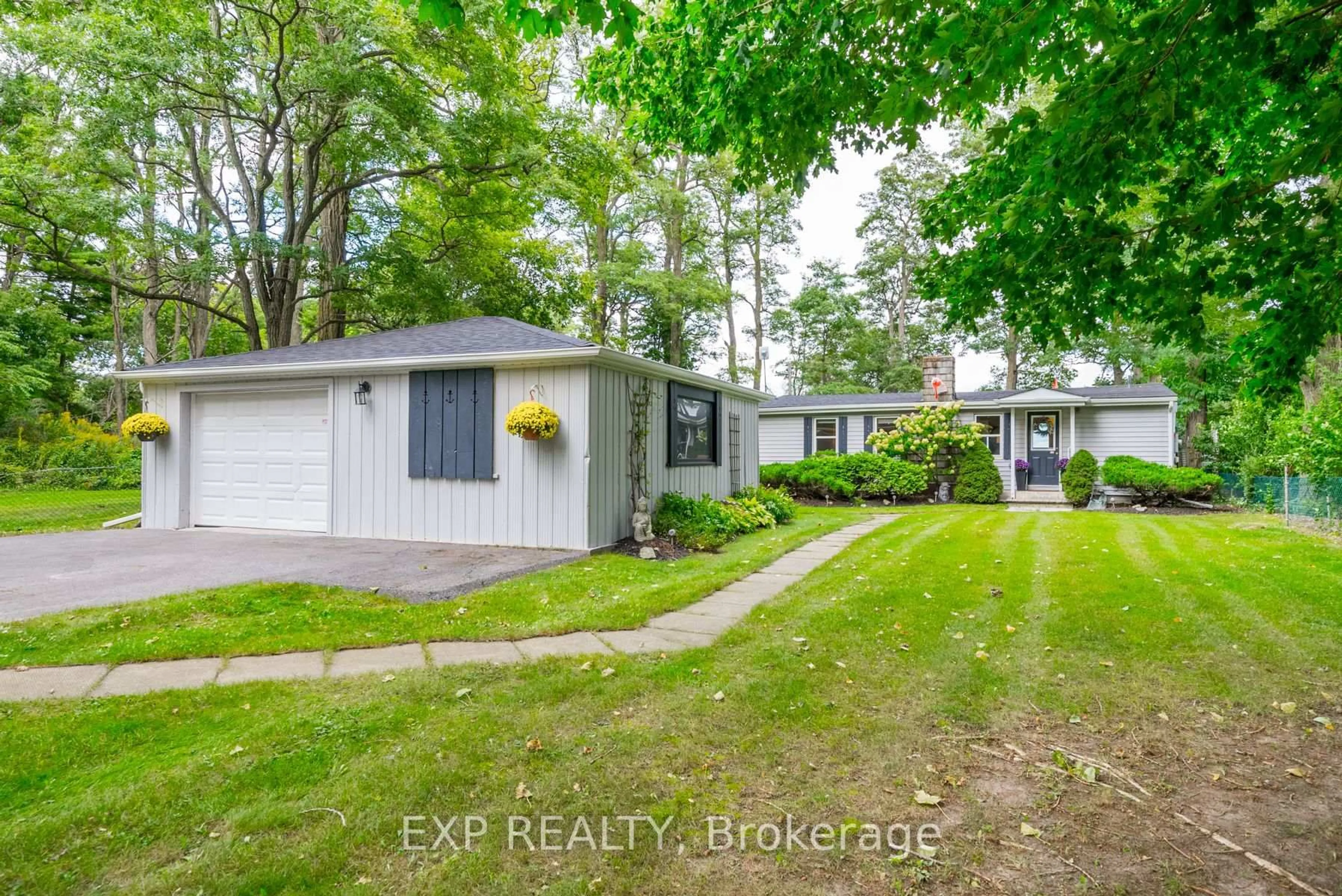 A pic from outside/outdoor area/front of a property/back of a property/a pic from drone, street for 113 Victoria Beach Rd, Cramahe Ontario K0K 1S0