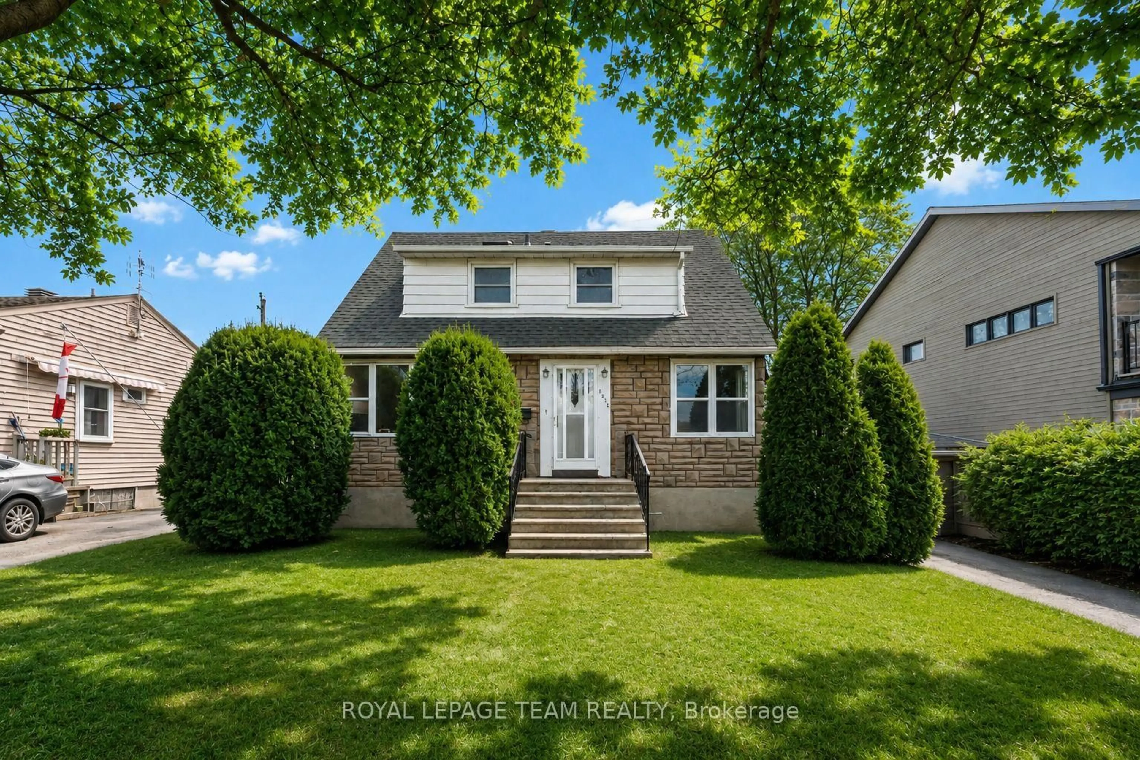 Home with vinyl exterior material, street for 1272 Livingstone Ave, Ottawa Ontario K1H 7P8