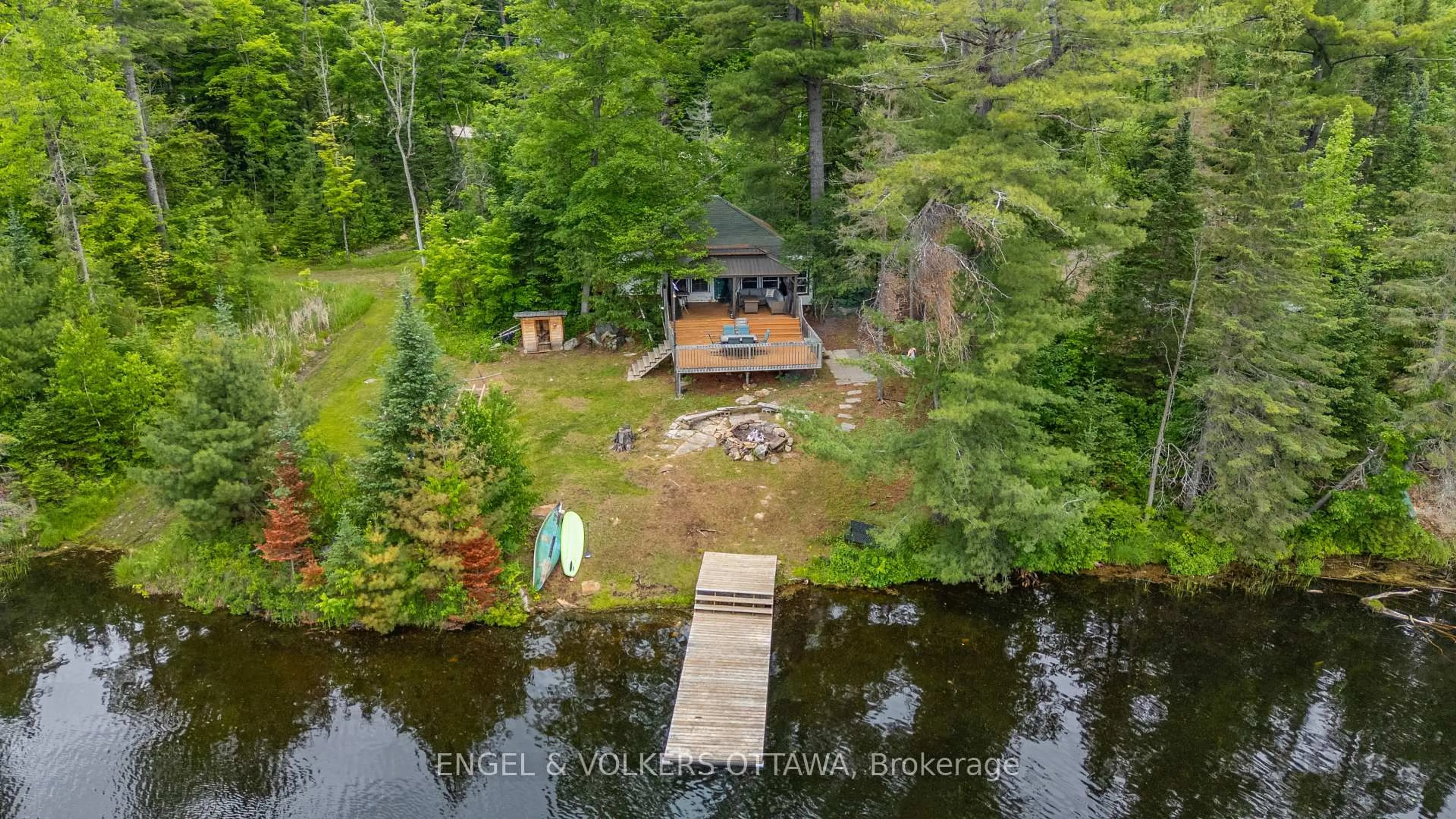 A pic from outside/outdoor area/front of a property/back of a property/a pic from drone, water/lake/river/ocean view for 1779 Centennial Lake Rd, Calabogie Ontario K0J 1H0