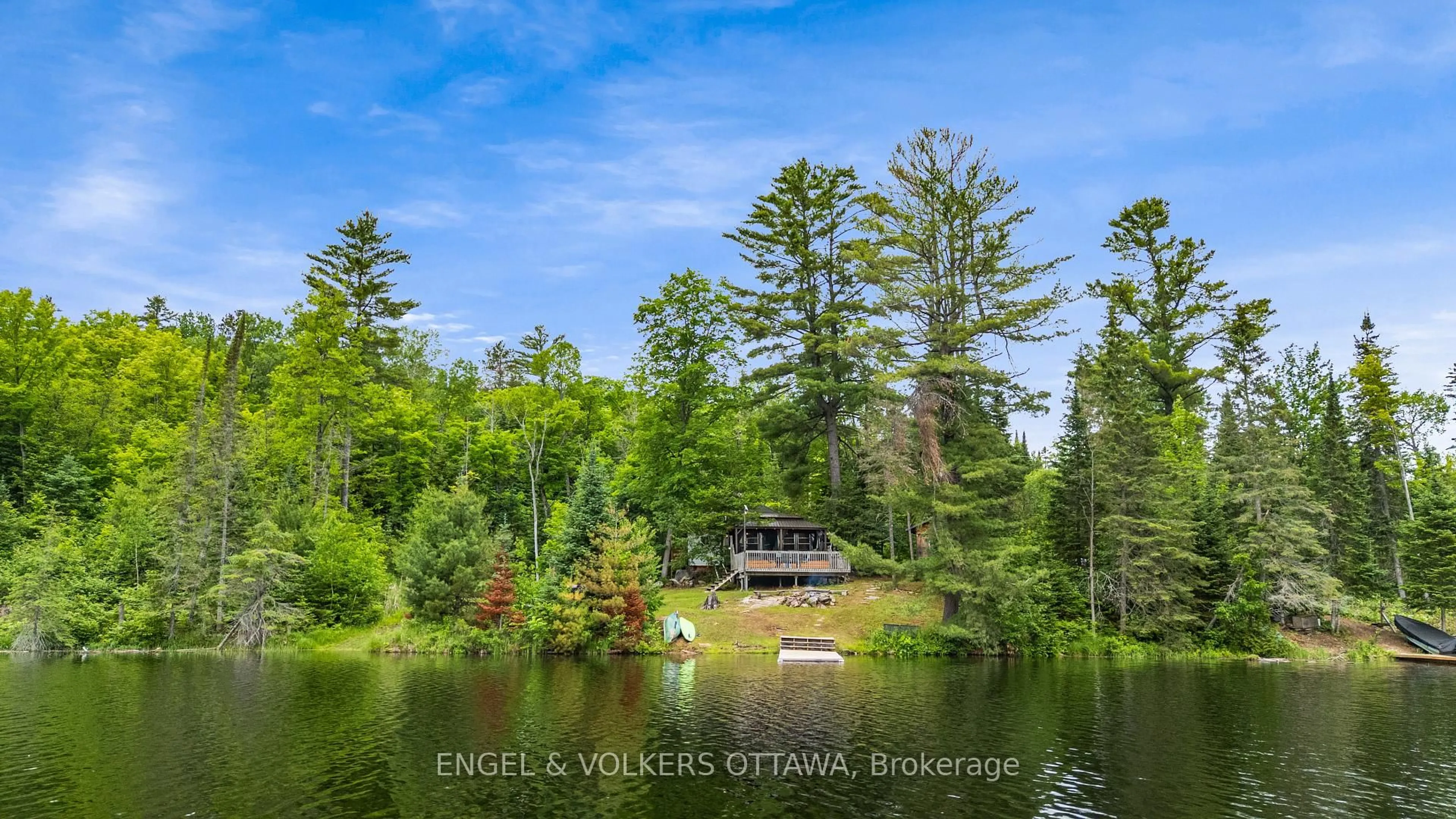 A pic from outside/outdoor area/front of a property/back of a property/a pic from drone, water/lake/river/ocean view for 1779 Centennial Lake Rd, Calabogie Ontario K0J 1H0