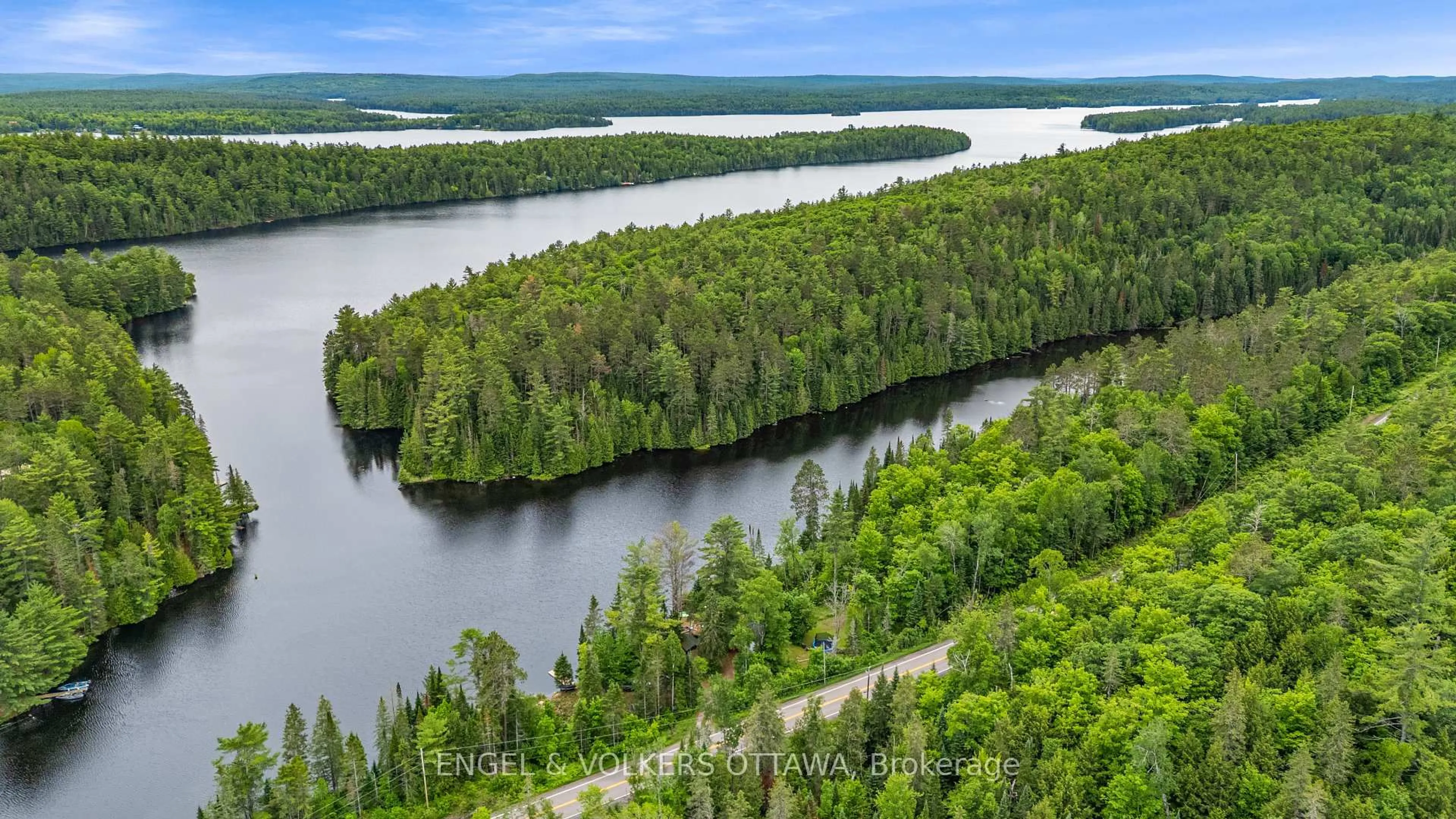 A pic from outside/outdoor area/front of a property/back of a property/a pic from drone, water/lake/river/ocean view for 1779 Centennial Lake Rd, Calabogie Ontario K0J 1H0