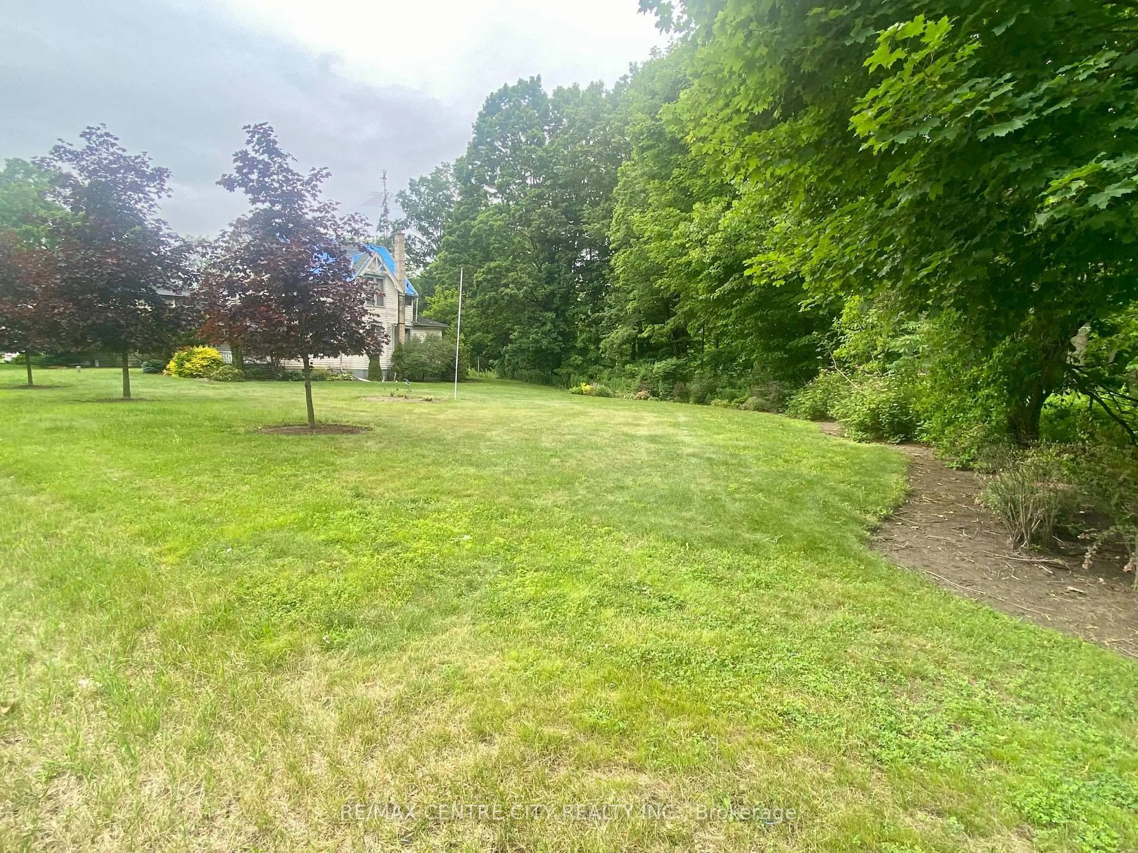 A pic from outside/outdoor area/front of a property/back of a property/a pic from drone, forest/trees view for 46124 Sparta Line, Central Elgin Ontario N5P 3S8