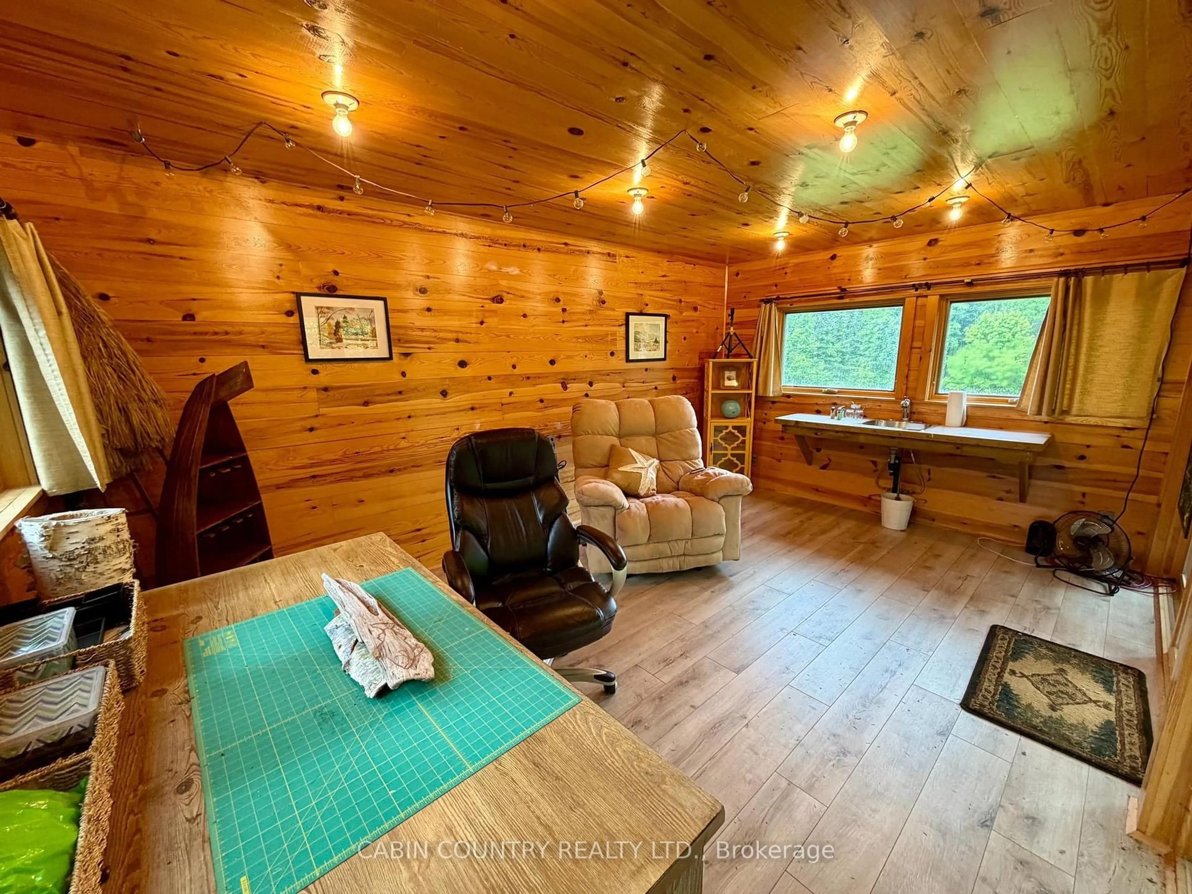 Living room with furniture, wood/laminate floor for 180 Whitefish Bay Island 43 Sioux Narrows, Sioux Narrows-Nestor Falls Ontario P0X 0A4