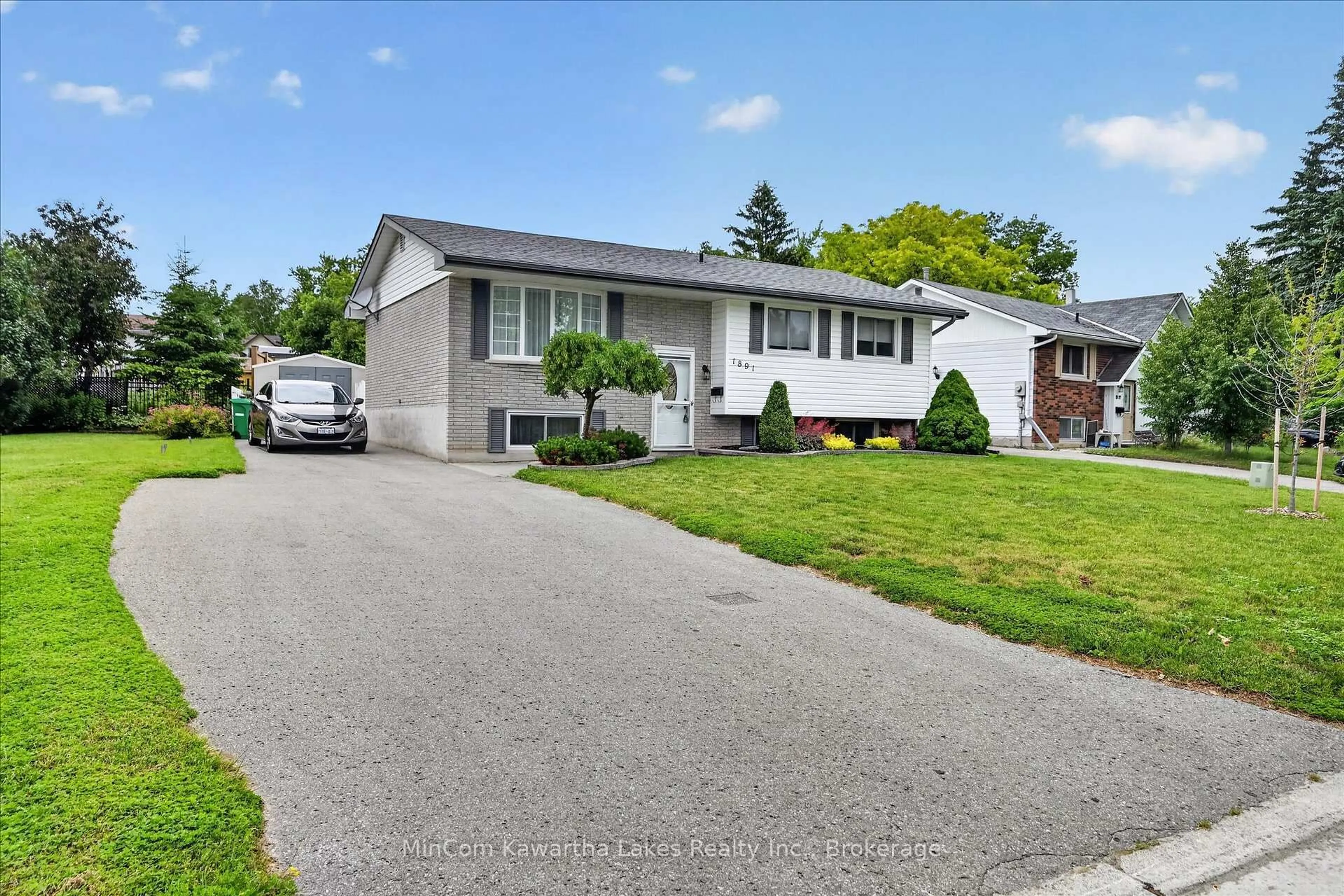 Home with vinyl exterior material, street for 1891 Croftdale Cres, Peterborough Ontario K9K 1J7