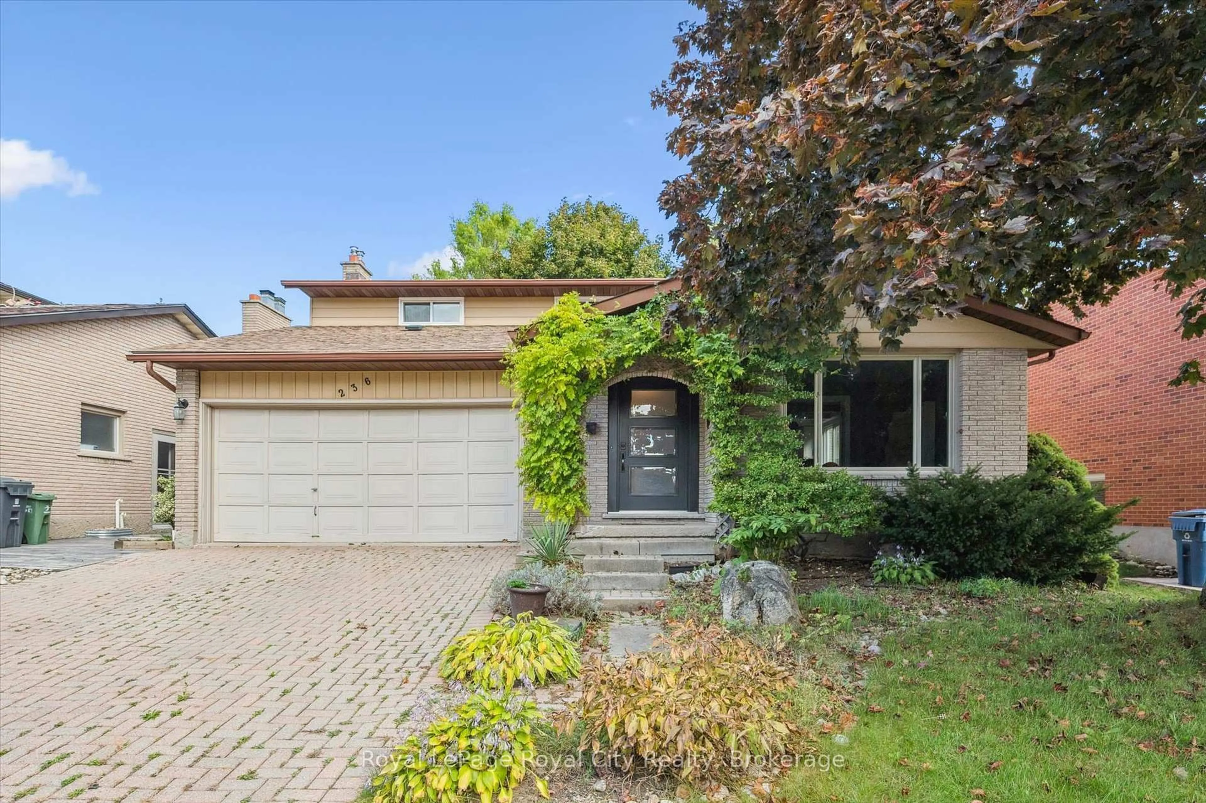 Home with brick exterior material, street for 236 Ironwood Rd, Guelph Ontario N1G 3G1