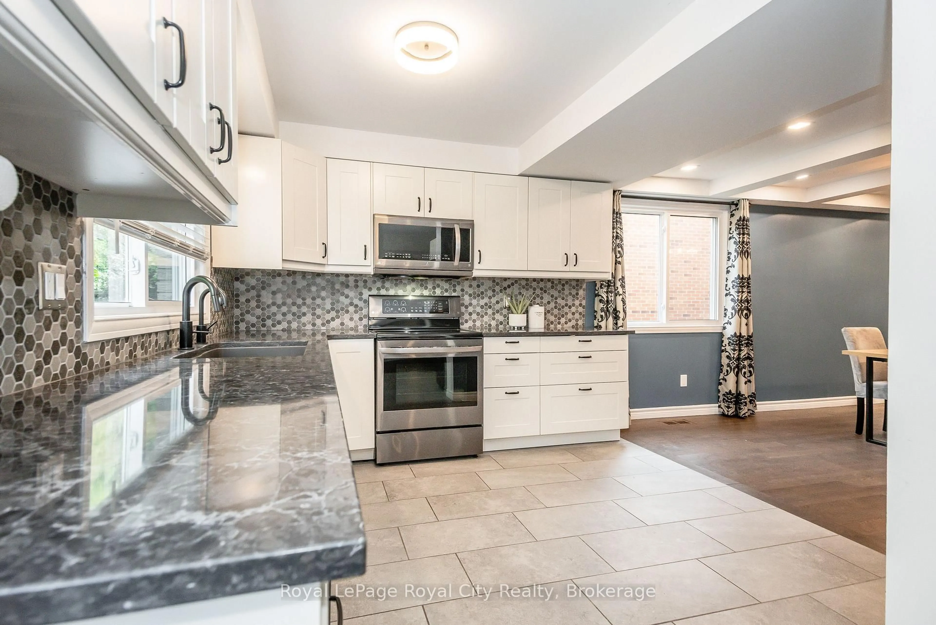 Open concept kitchen, ceramic/tile floor for 236 Ironwood Rd, Guelph Ontario N1G 3G1