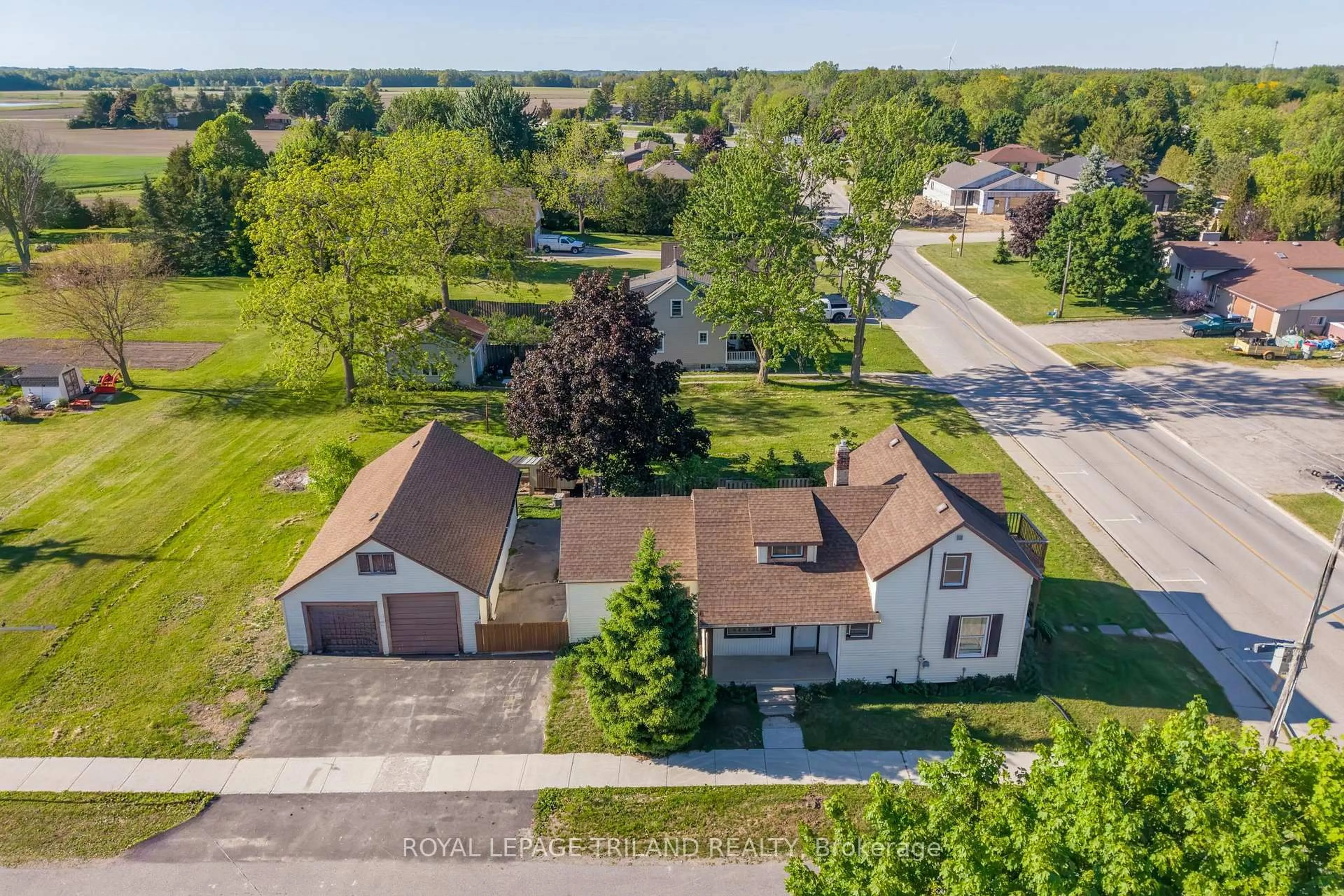 A pic from outside/outdoor area/front of a property/back of a property/a pic from drone, street for 52 Nelson St, Lambton Shores Ontario N0M 2N0