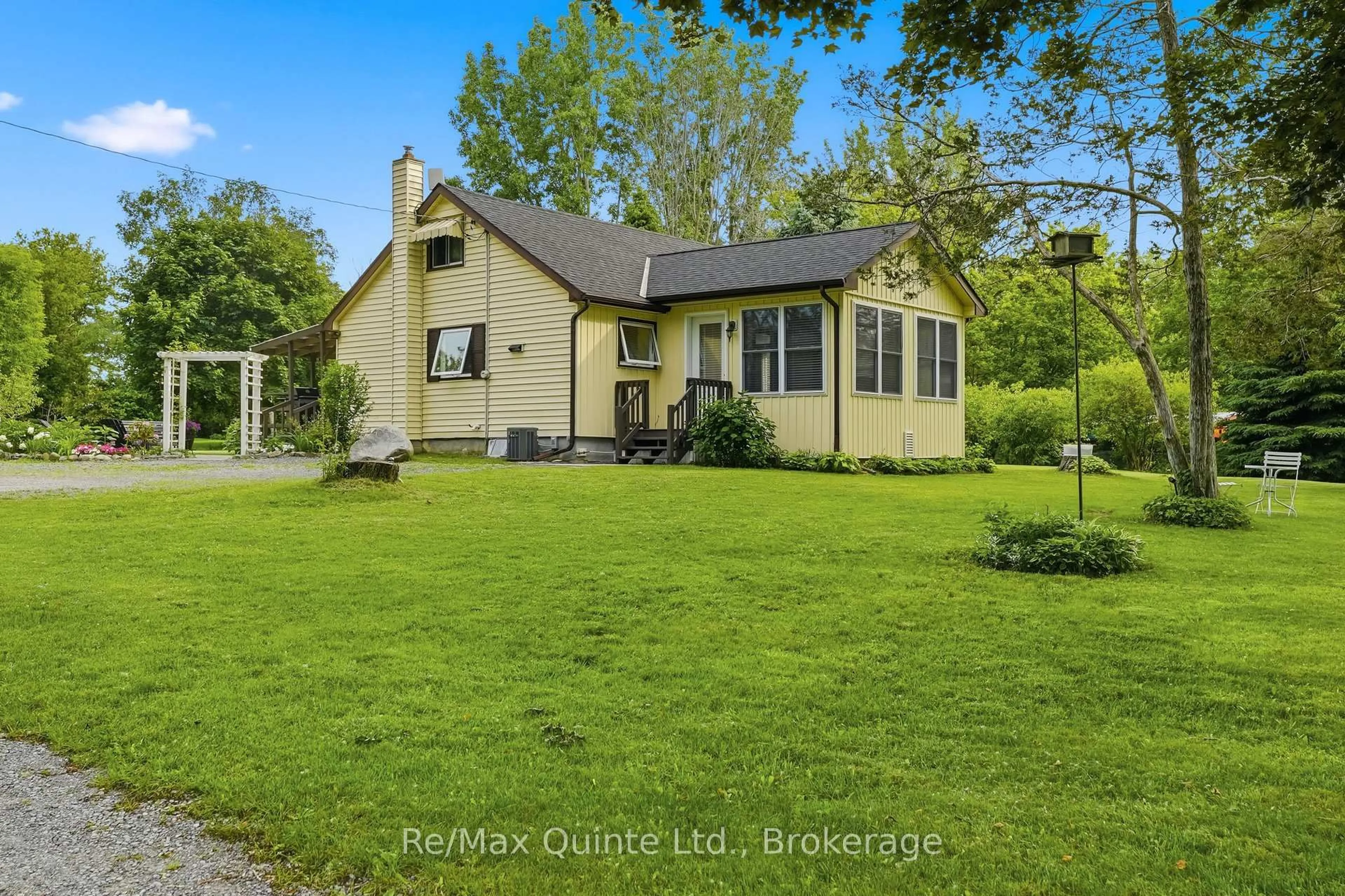A pic from outside/outdoor area/front of a property/back of a property/a pic from drone, street for 97C County Road 18, Prince Edward County Ontario K0K 1P0