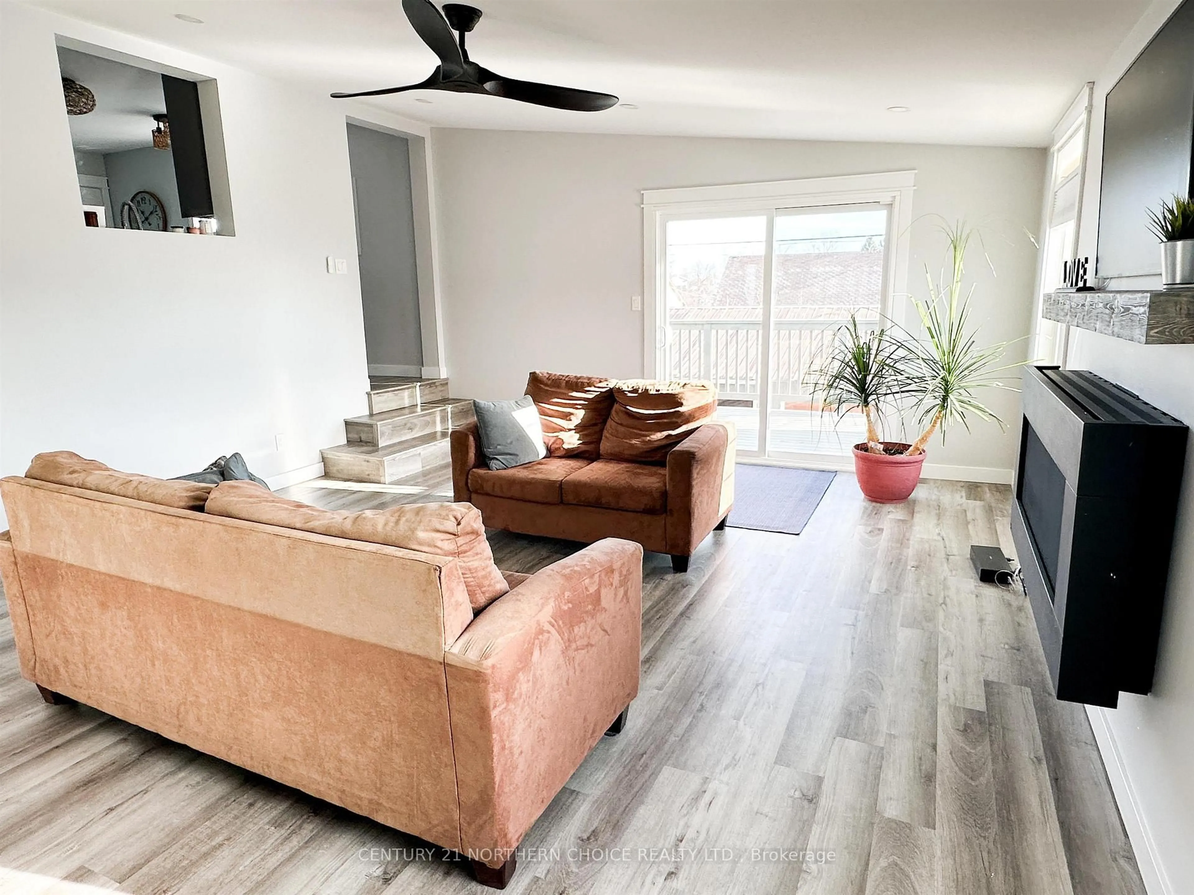 Living room with furniture, wood/laminate floor for 4 Fifth St, Red Lake Ontario P0V 1C0