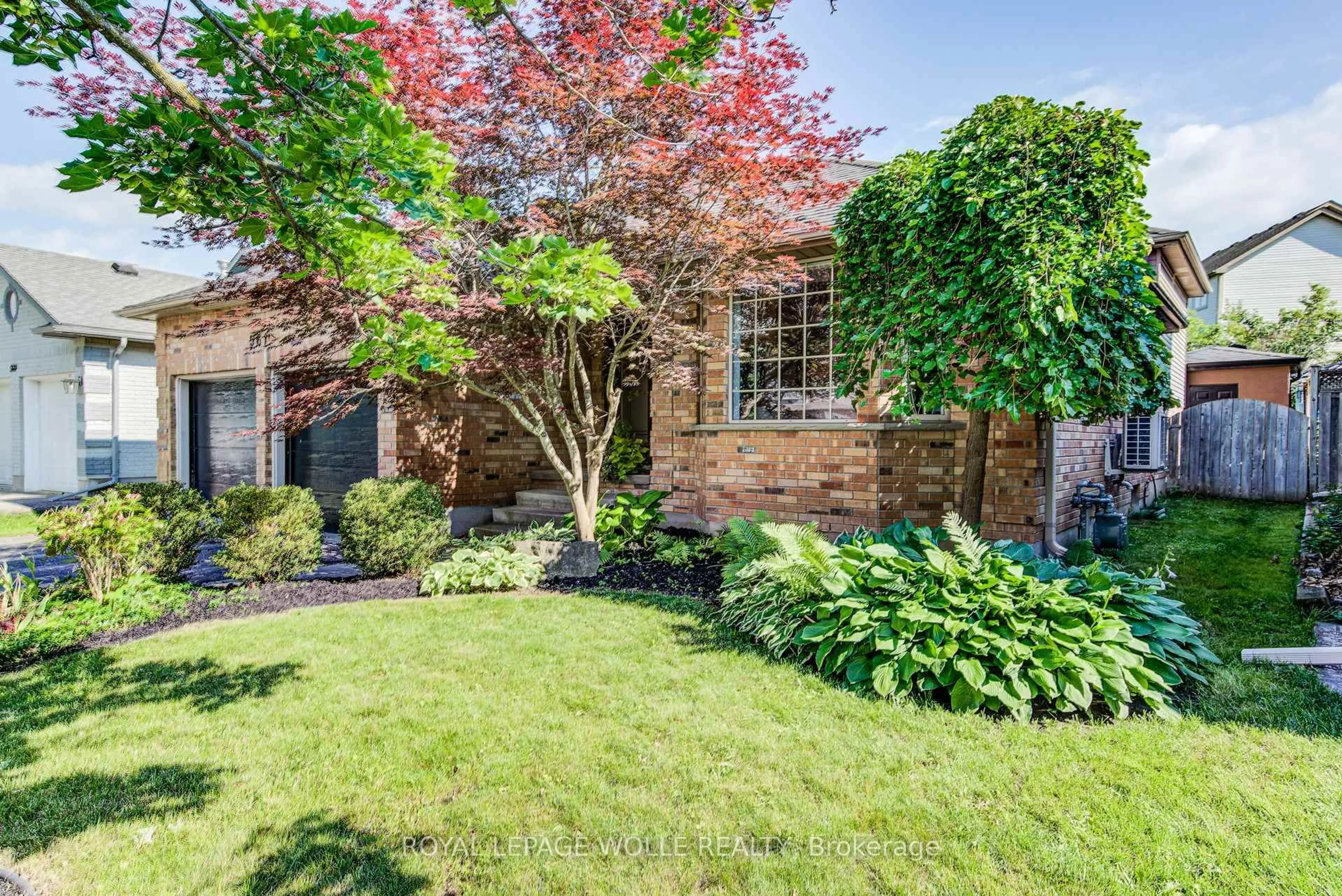 Home with brick exterior material, street for 561 Chancery Lane, Waterloo Ontario N2T 2N5