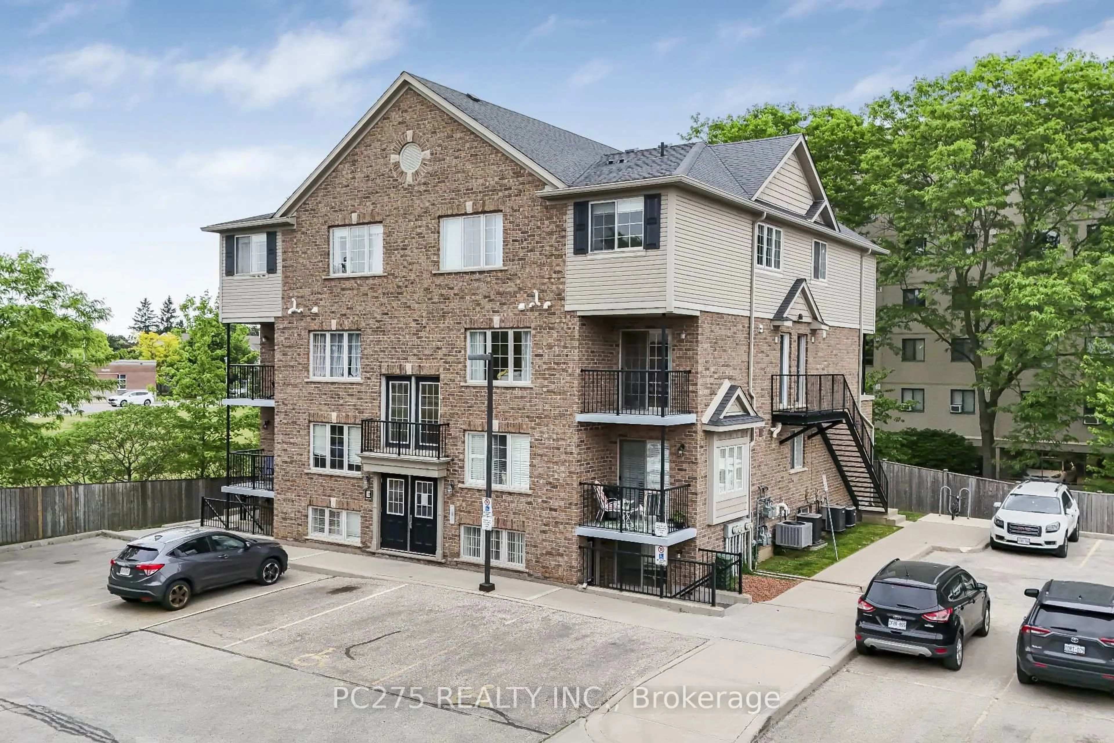 A pic from outside/outdoor area/front of a property/back of a property/a pic from drone, unknown for 12 Holborn Dr #E37, Kitchener Ontario N2A 0A4