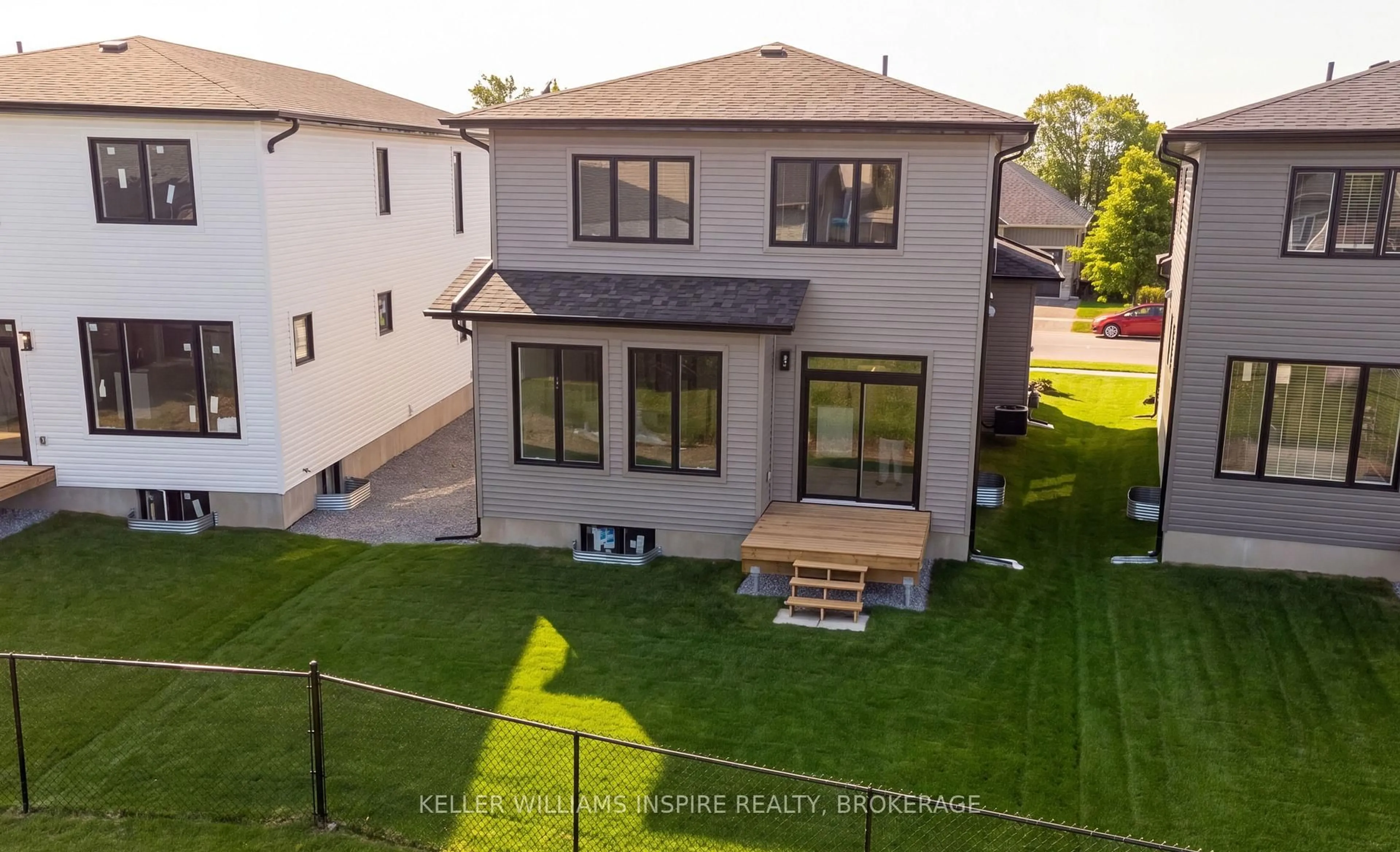 A pic from outside/outdoor area/front of a property/back of a property/a pic from drone, street for 128 McDonough Cres, Loyalist Ontario K7N 0A4