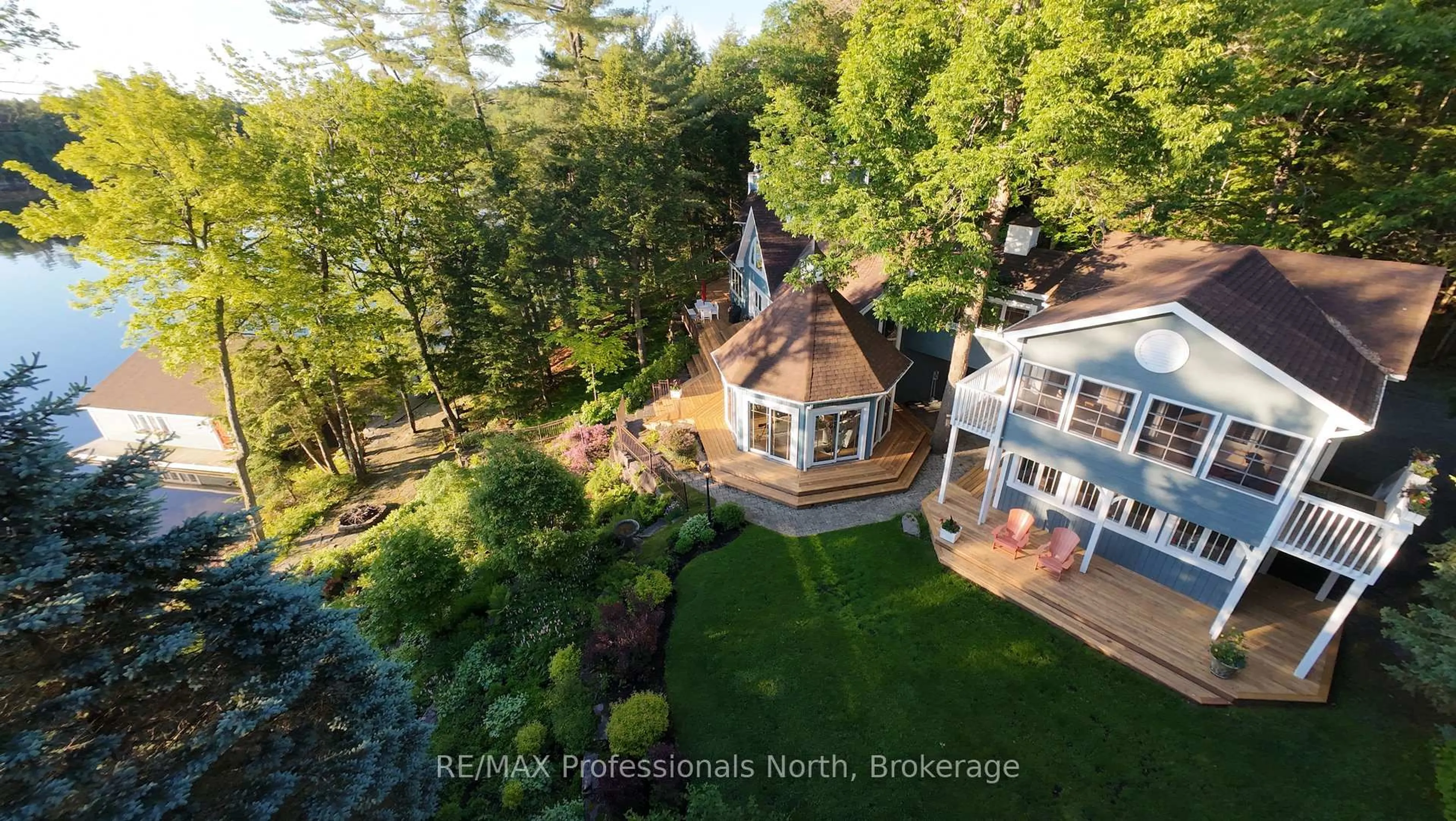 A pic from outside/outdoor area/front of a property/back of a property/a pic from drone, water/lake/river/ocean view for 4113 South Portage Rd, Huntsville Ontario P1H 2J3