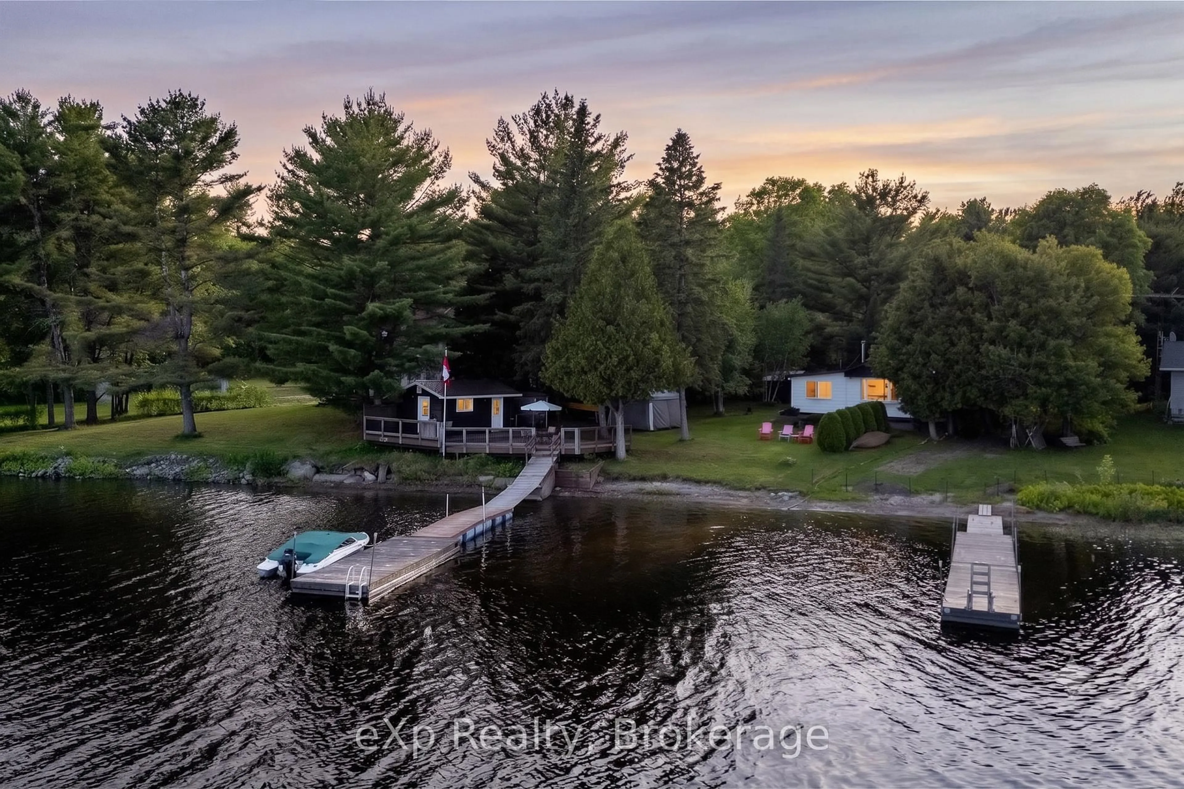 A pic from outside/outdoor area/front of a property/back of a property/a pic from drone, water/lake/river/ocean view for 116 Whippoorwill Rd, French River Ontario P0M 1A0