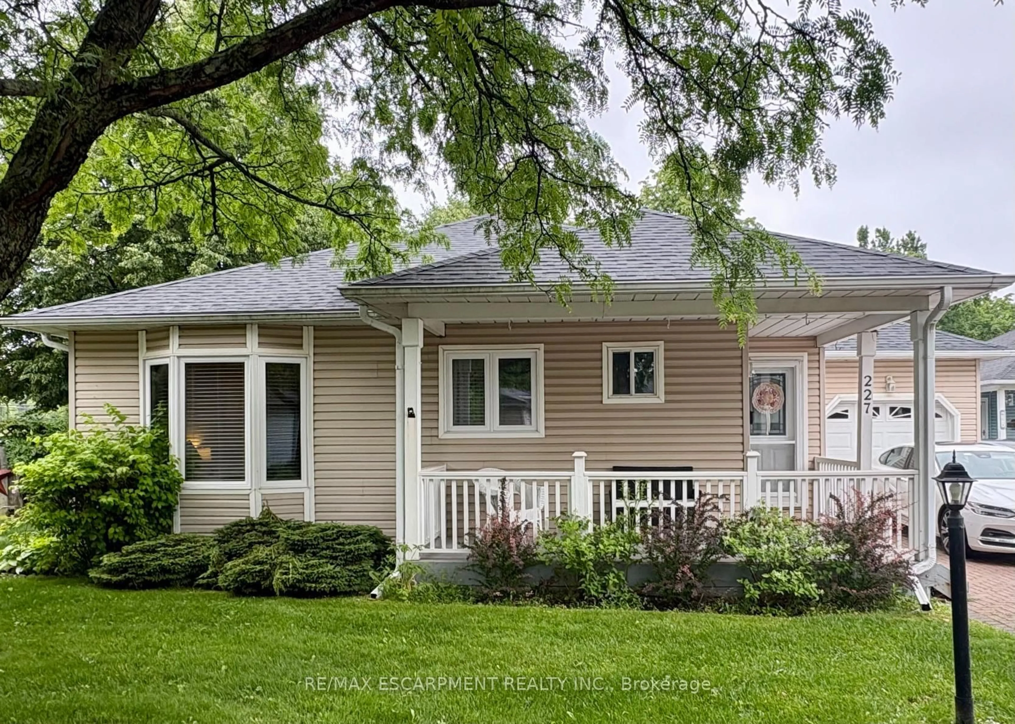 Home with vinyl exterior material, street for 227 Silverbirch Blvd, Hamilton Ontario L0R 1W0