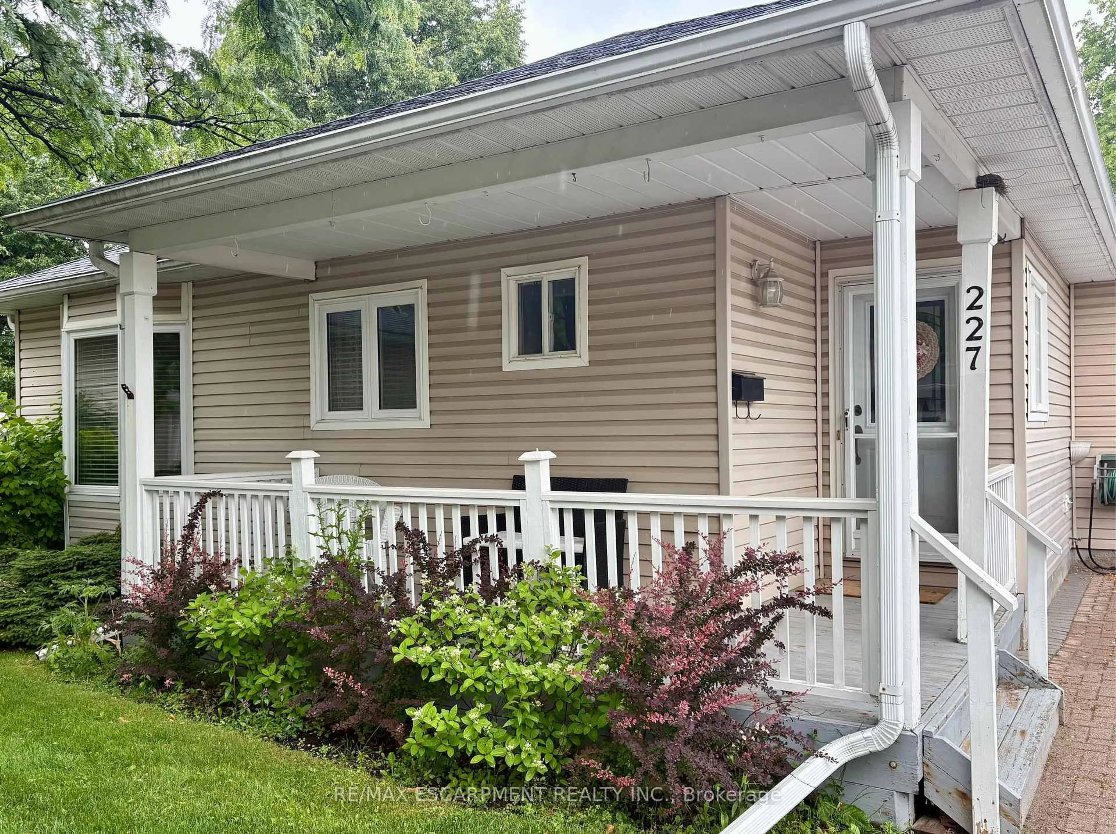 Home with vinyl exterior material, street for 227 Silverbirch Blvd, Hamilton Ontario L0R 1W0