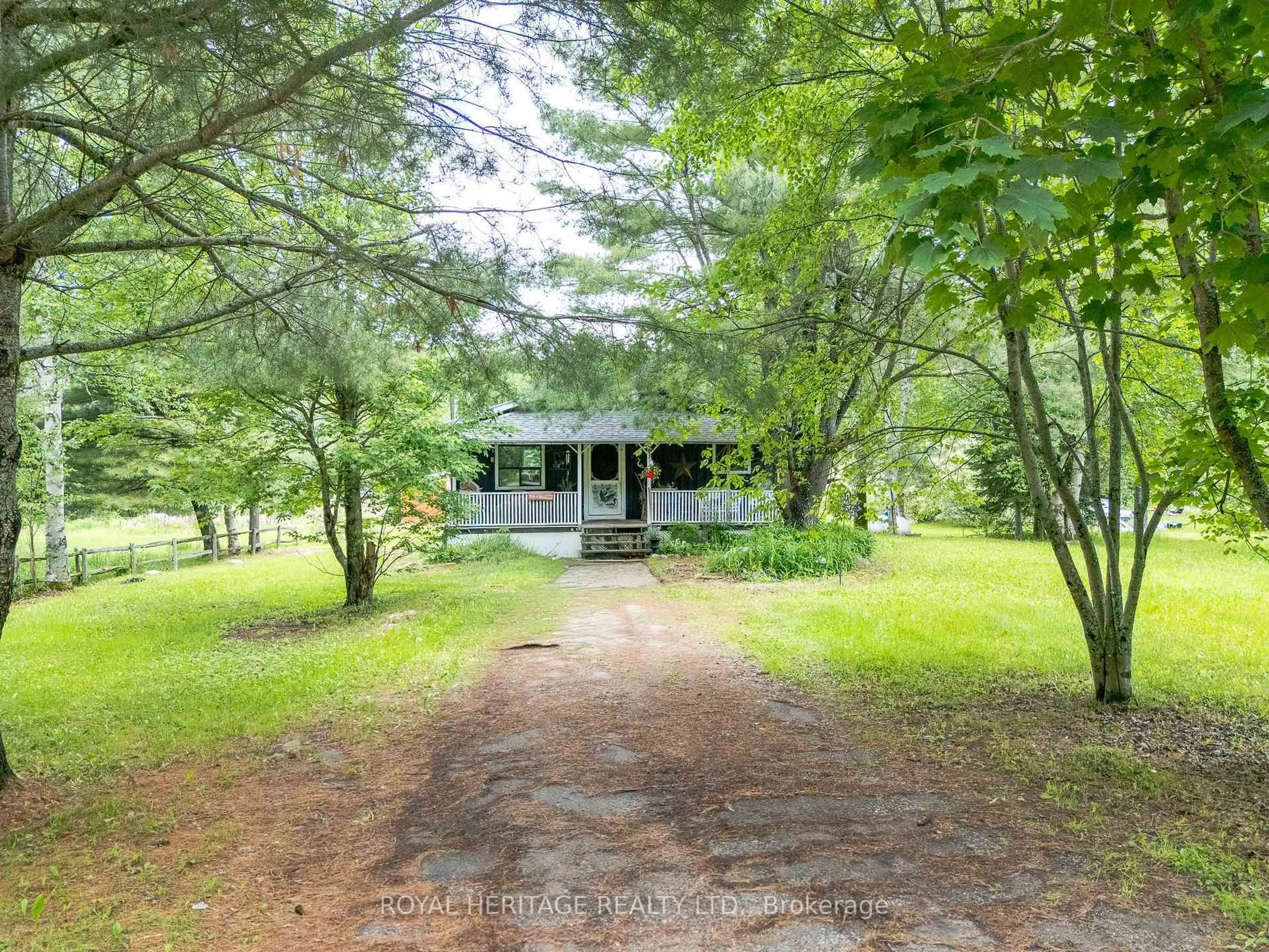 A pic from outside/outdoor area/front of a property/back of a property/a pic from drone, forest/trees view for 34 Gordon Point Rd, Magnetawan Ontario P0A 1P0
