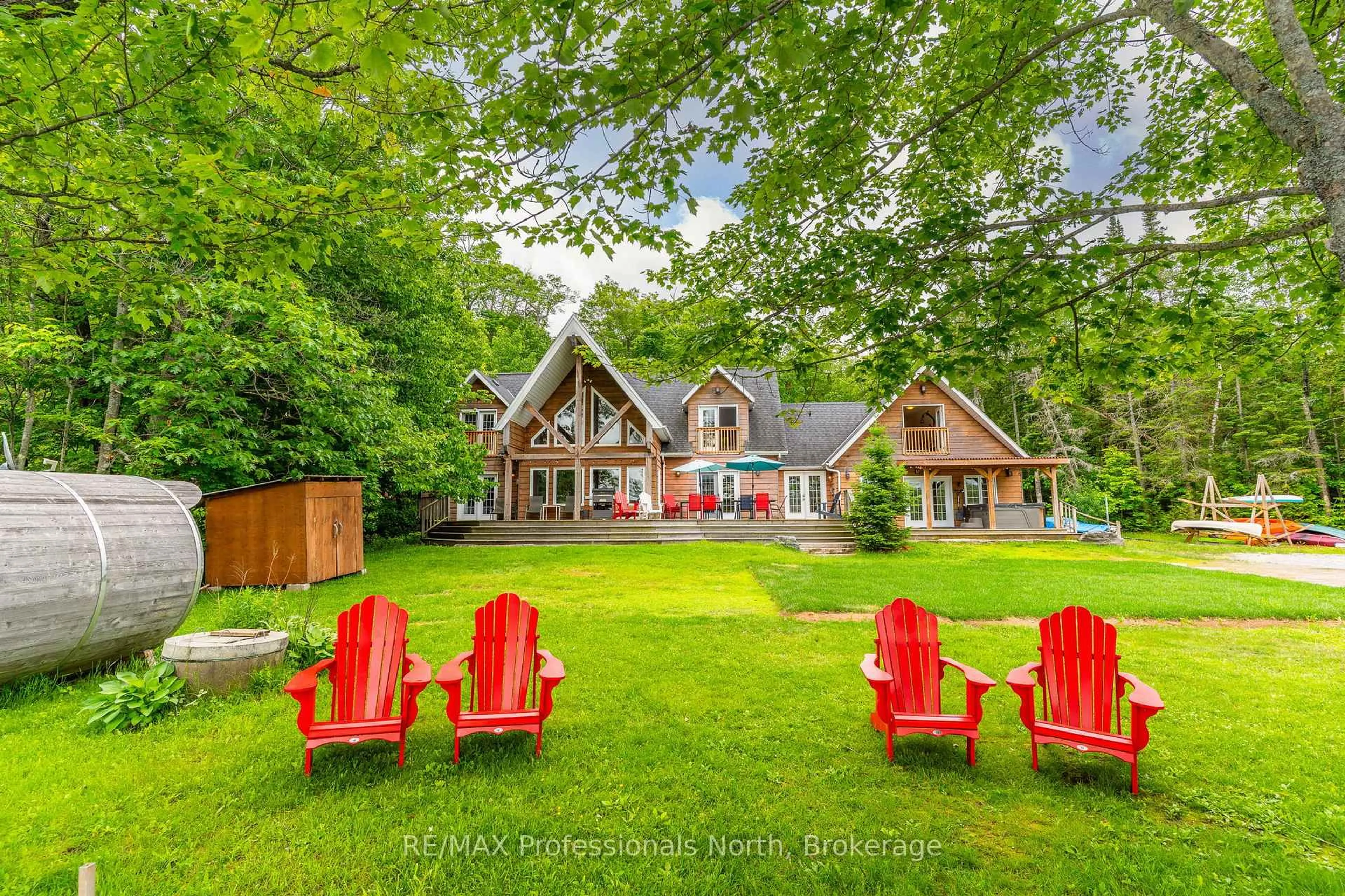 A pic from outside/outdoor area/front of a property/back of a property/a pic from drone, unknown for 17102 Highway 35, Algonquin Highlands Ontario K0M 1J1