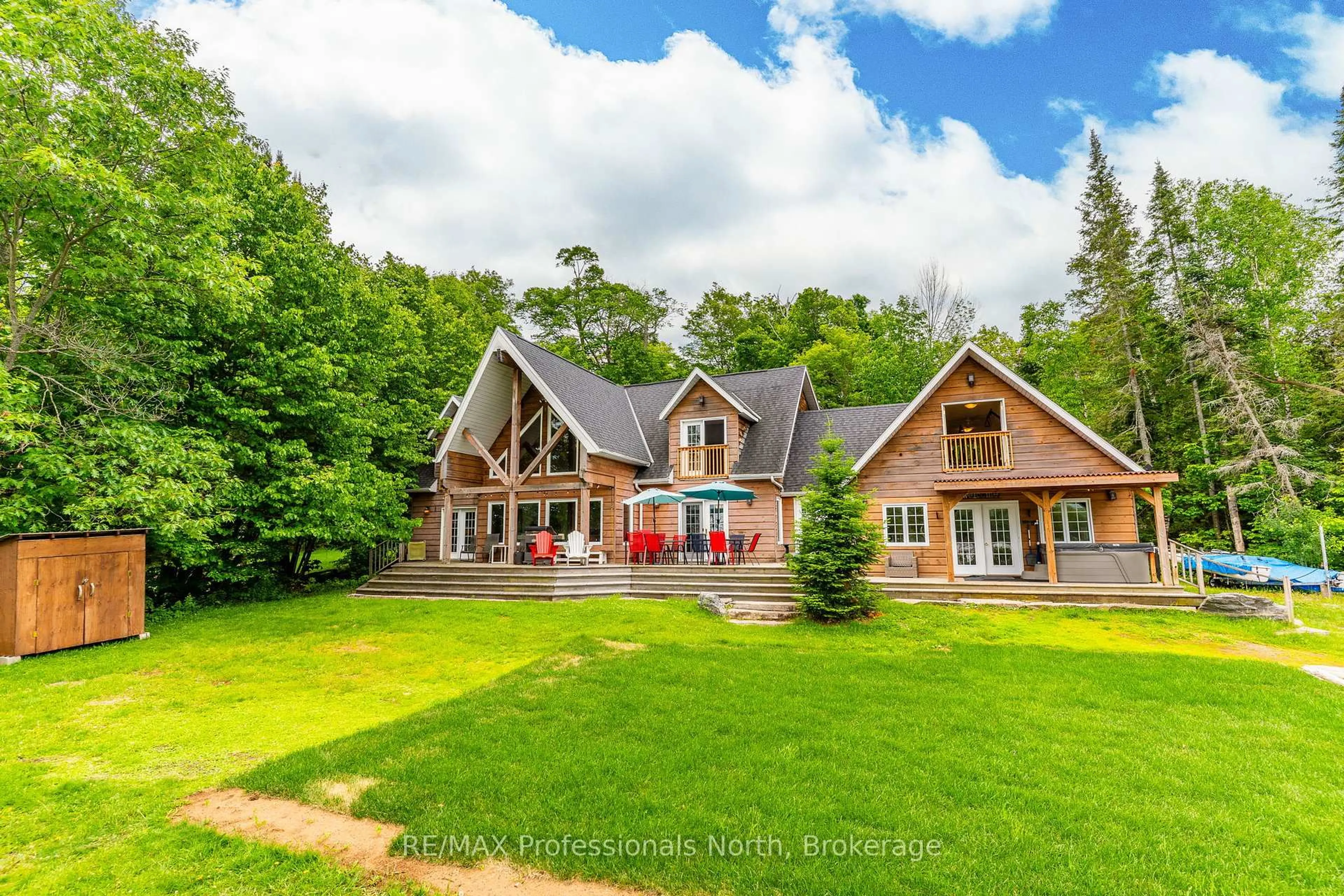 A pic from outside/outdoor area/front of a property/back of a property/a pic from drone, unknown for 17102 Highway 35, Algonquin Highlands Ontario K0M 1J1