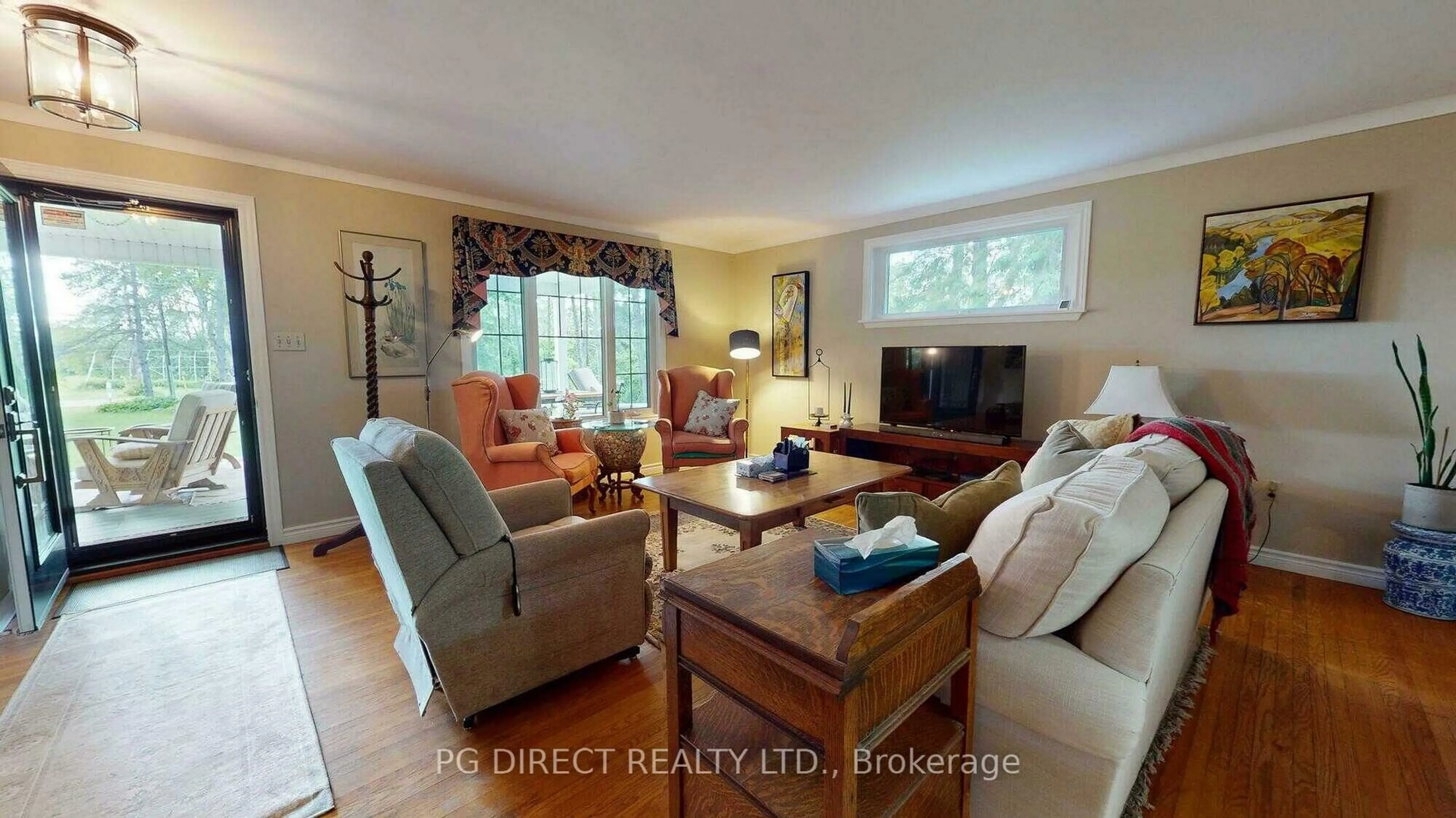 Living room with furniture, wood/laminate floor for 37 CKPC Rd, Brant Ontario N0E 1R0
