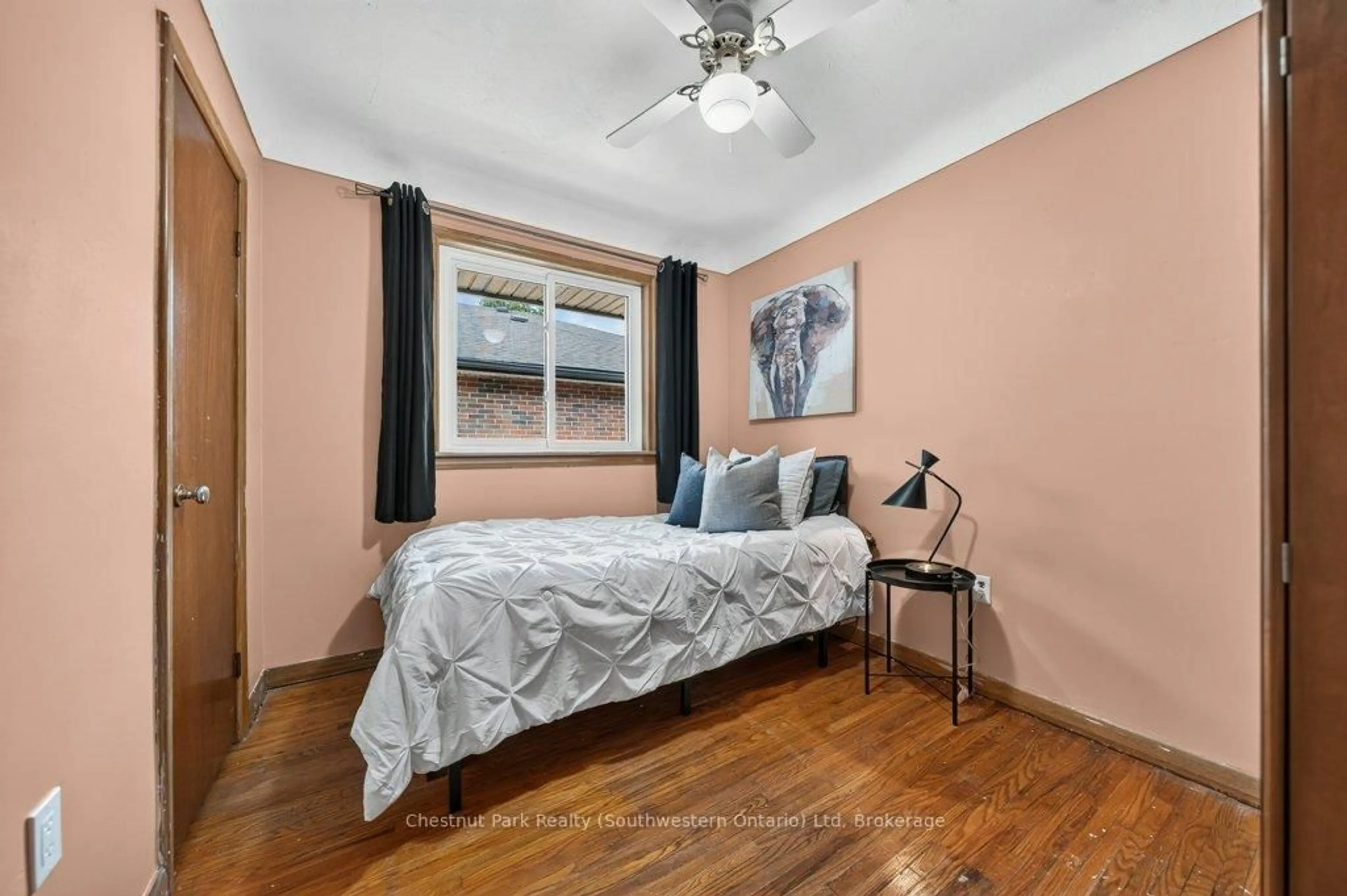 Bedroom with bed, wood/laminate floor for 39 Cedar St, Guelph Ontario N1G 1B9