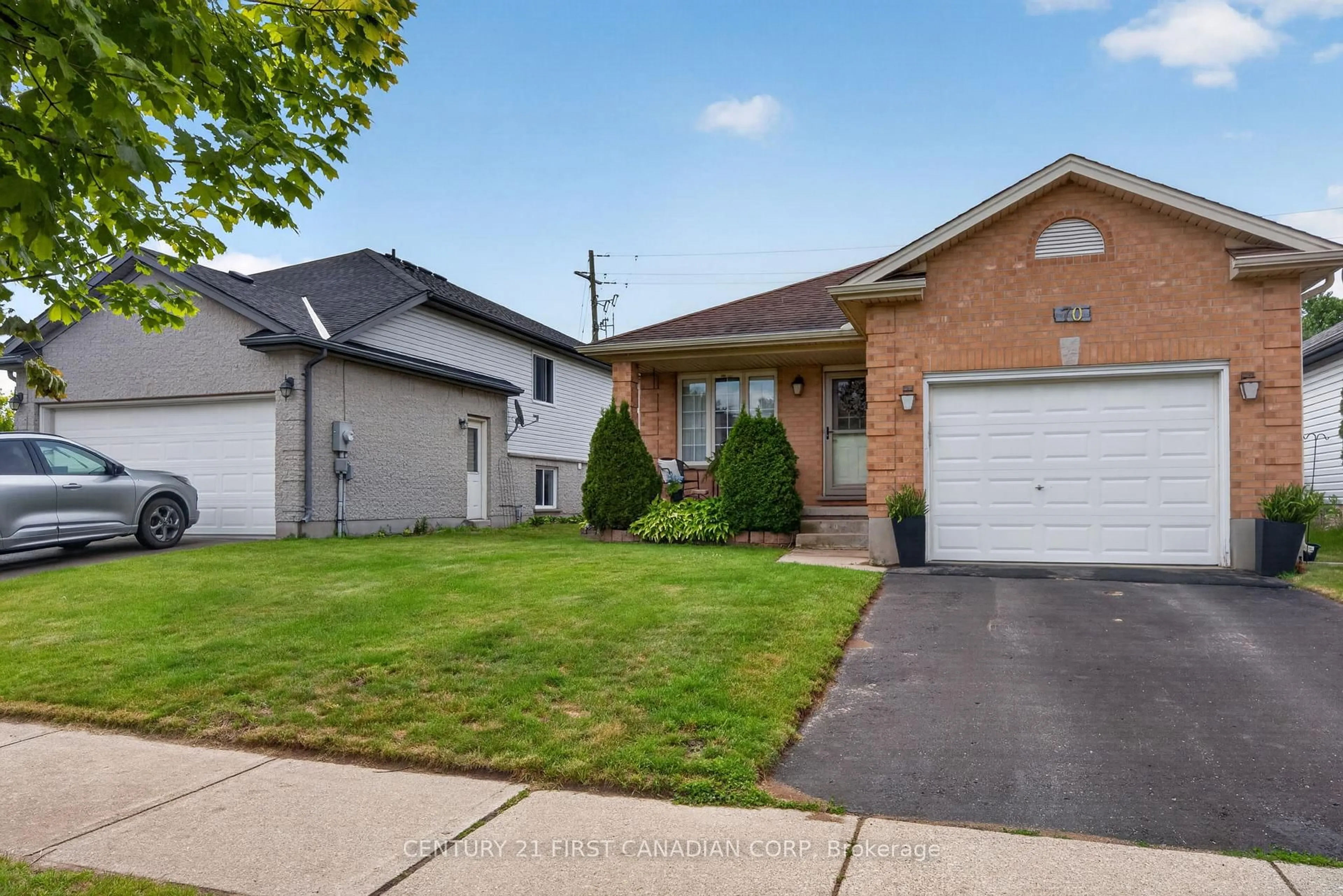 Home with brick exterior material, street for 70 Juniper Cres, Strathroy-Caradoc Ontario N7G 4H1