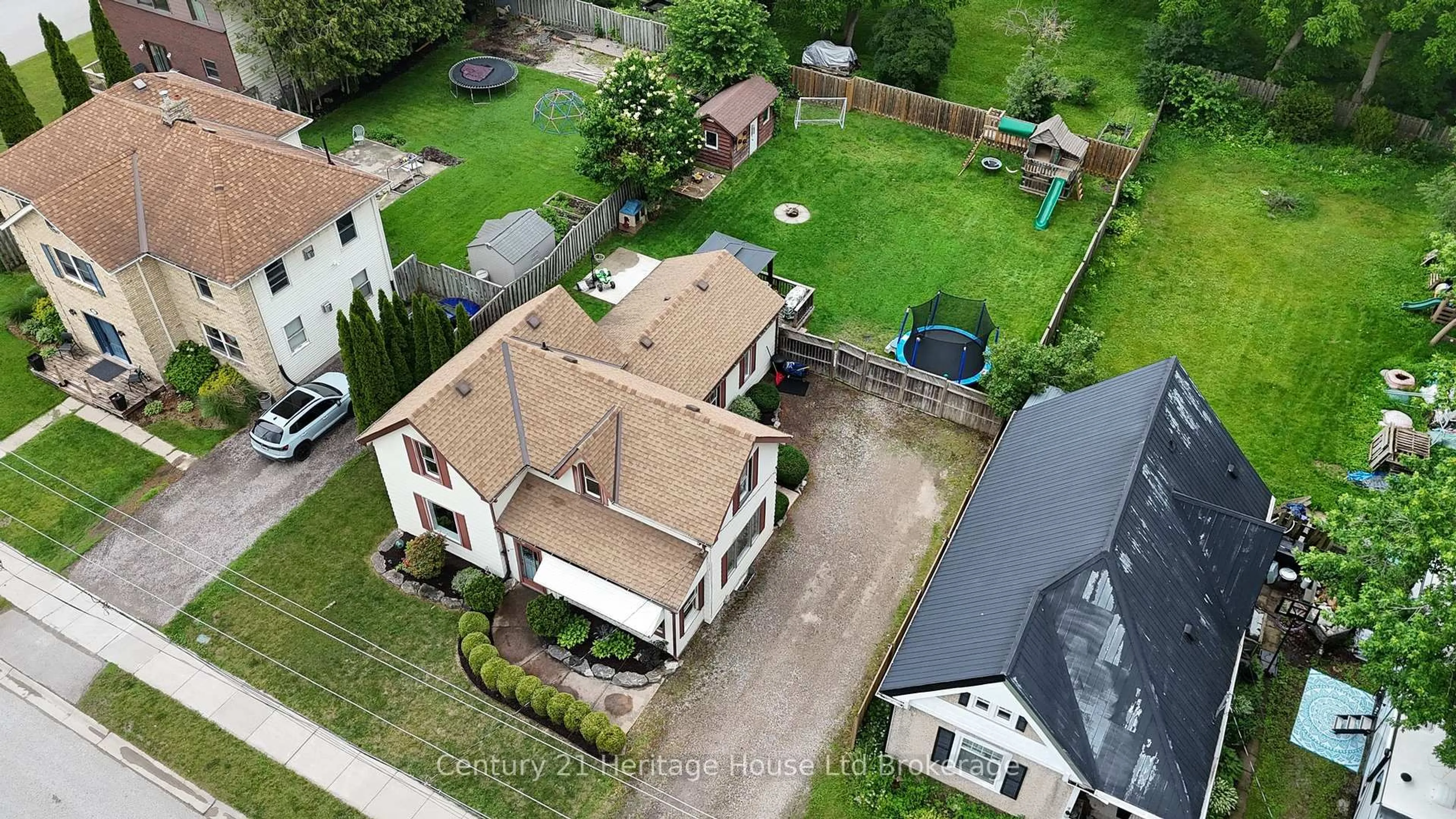 A pic from outside/outdoor area/front of a property/back of a property/a pic from drone, street for 164 George St, Zorra Ontario N0M 2M0