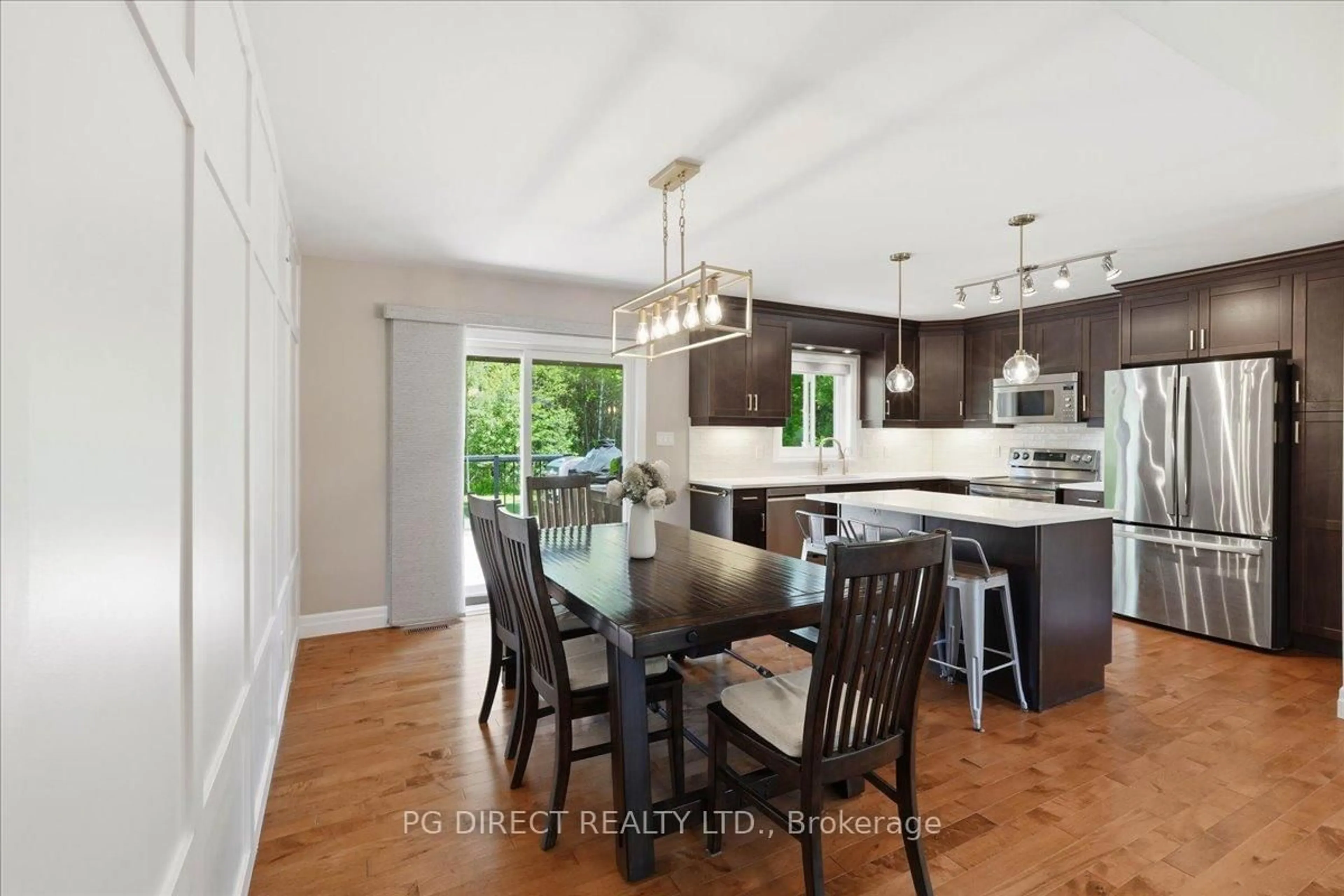 Open concept kitchen, wood/laminate floor for 49 Whispering Woods Dr, Trenton Ontario K8V 5P7