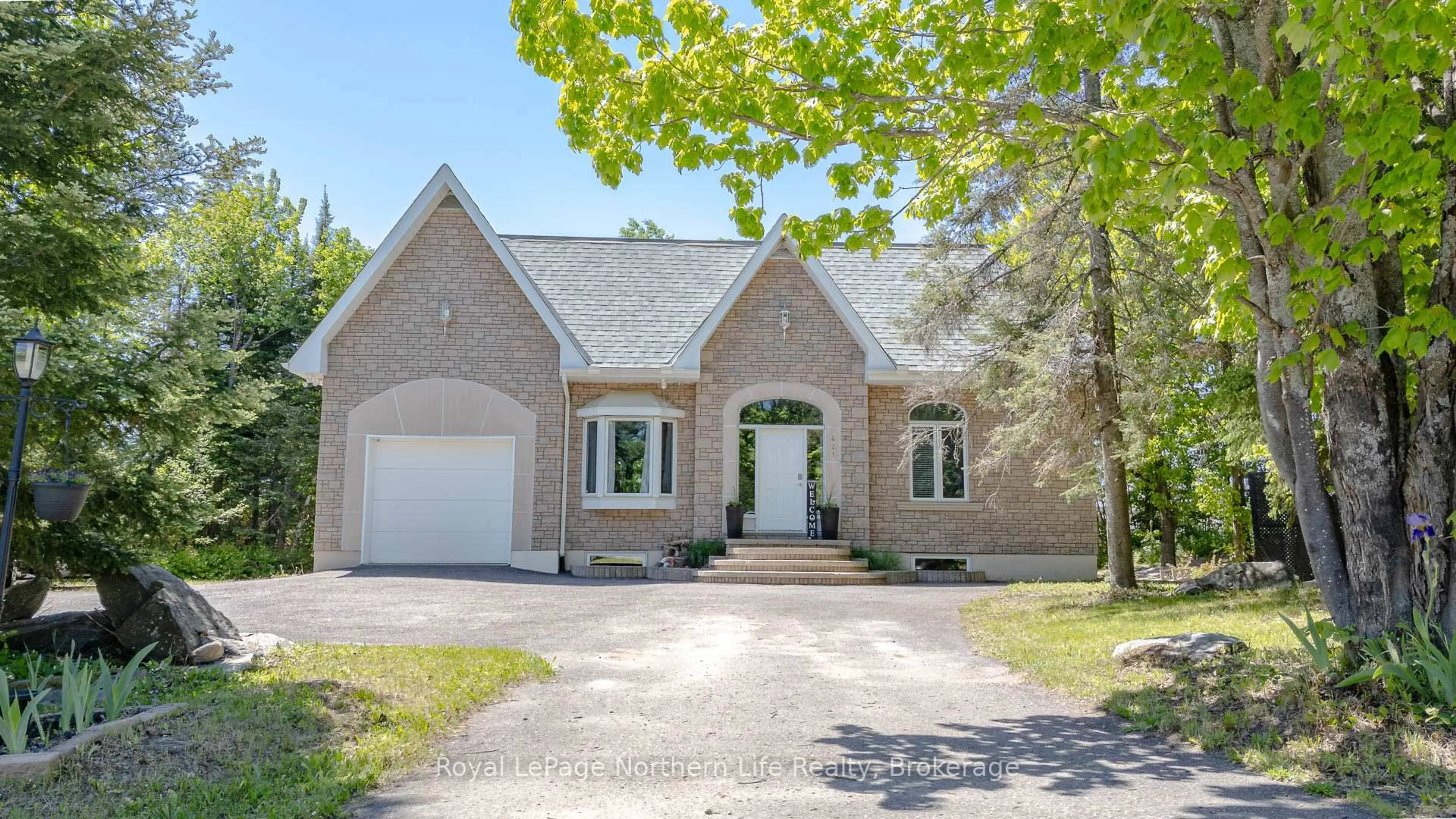 Home with brick exterior material, street for 421 Collins Dr, North Bay Ontario P1B 8G3
