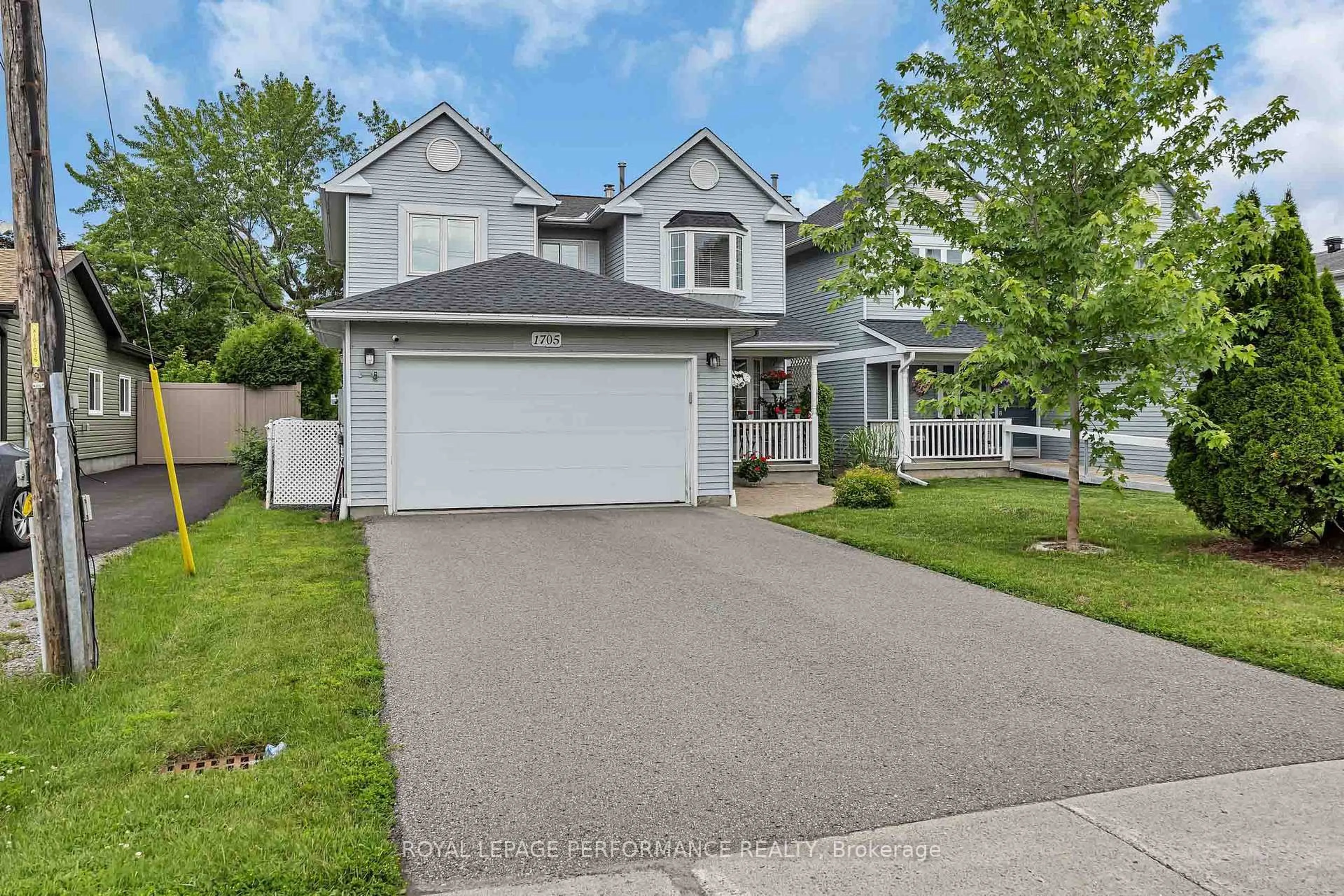 Home with vinyl exterior material, street for 1705 Belcourt Blvd, Orleans Ontario K1C 1M3