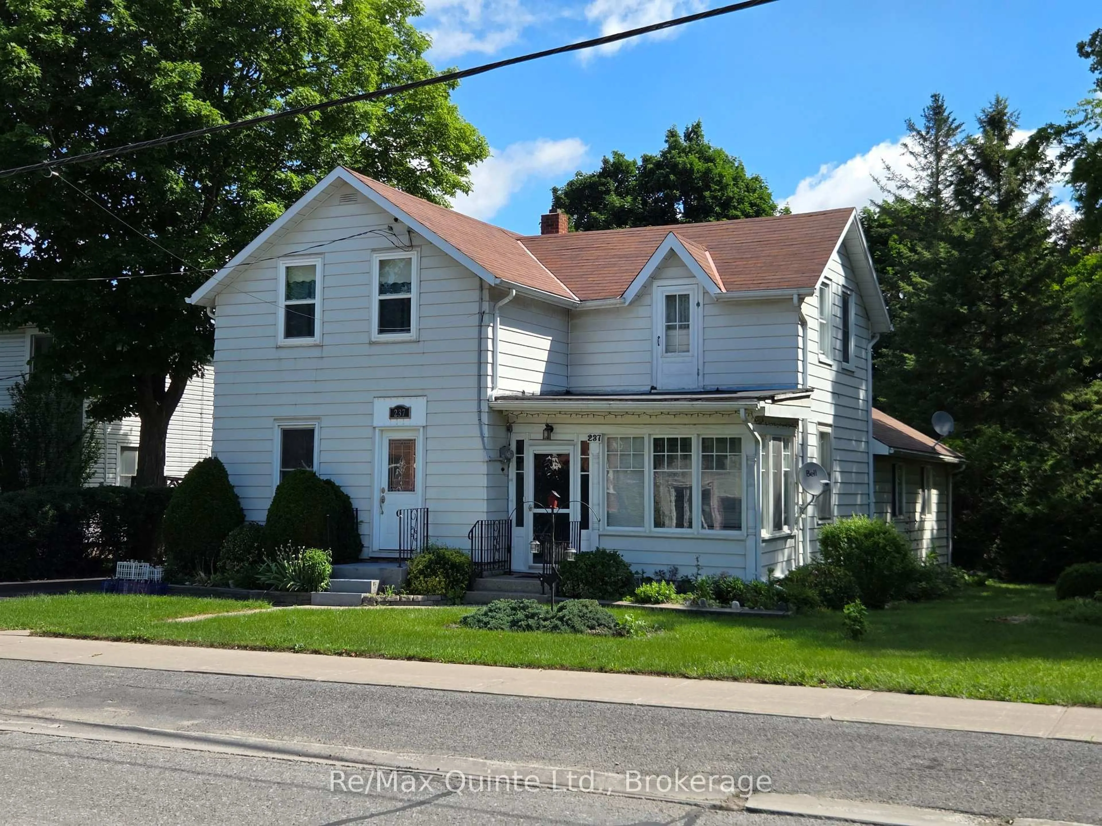 Home with vinyl exterior material, street for 237 Colborne St, Tweed Ontario K0K 3J0