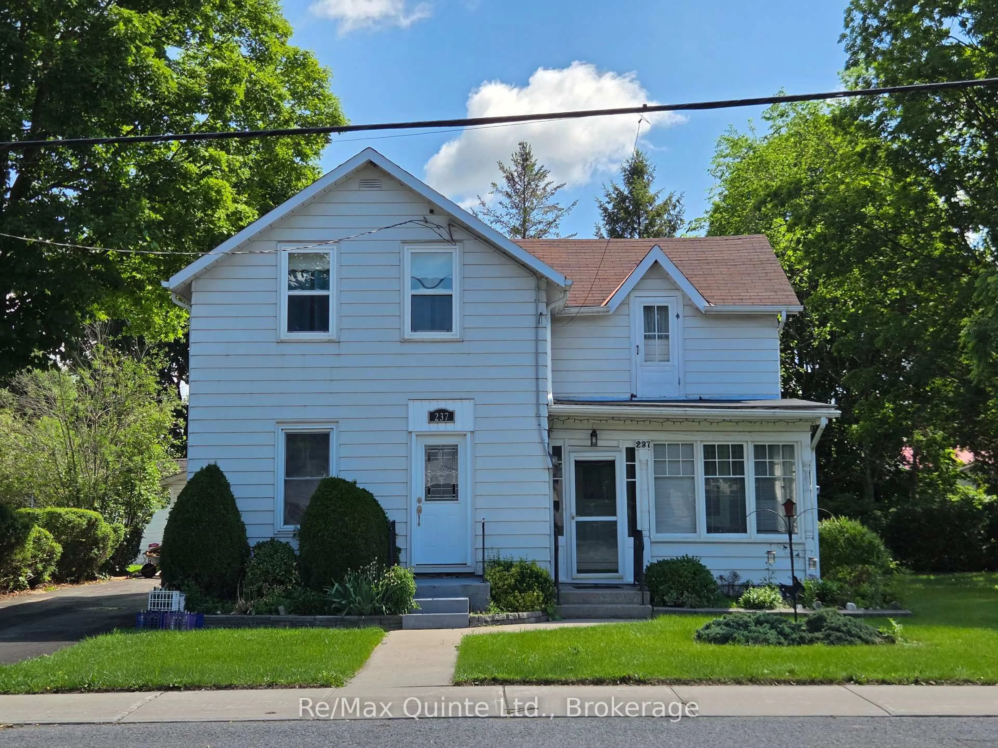 Home with vinyl exterior material, street for 237 Colborne St, Tweed Ontario K0K 3J0