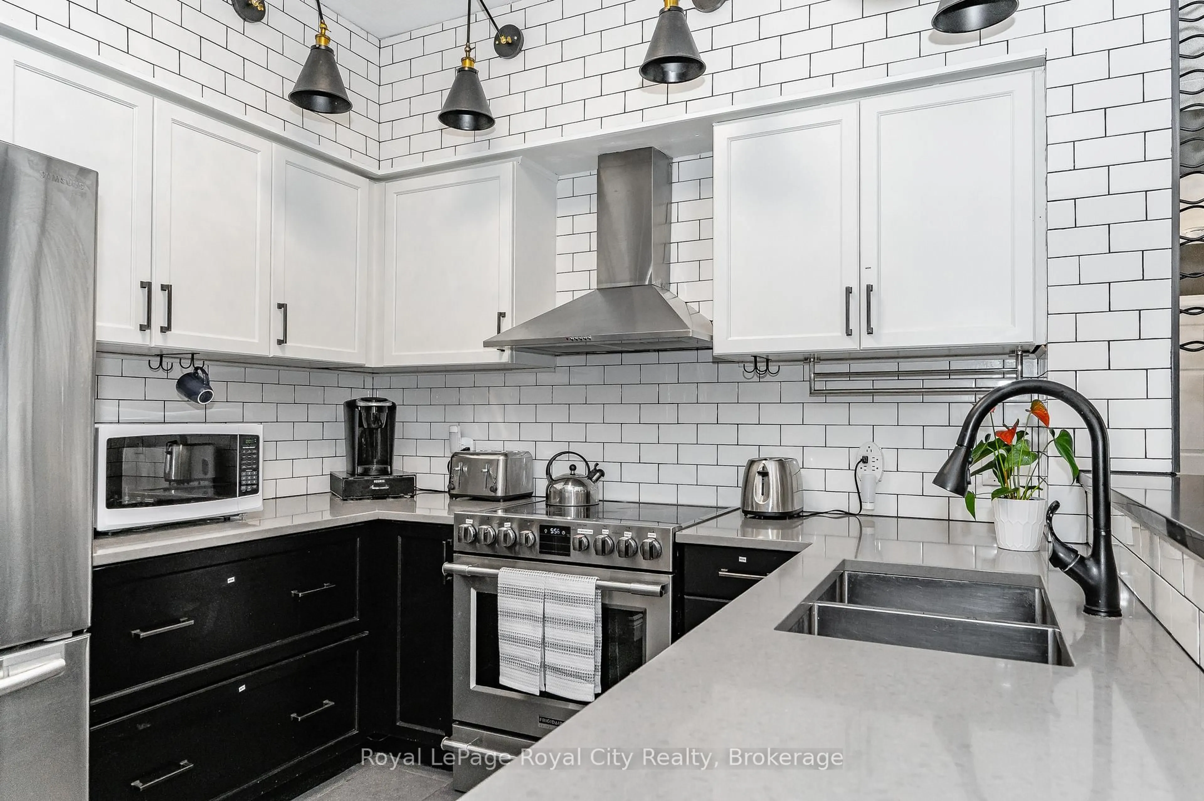 Contemporary kitchen, ceramic/tile floor for 308 Watson Pkwy #102, Guelph Ontario N1E 0G7
