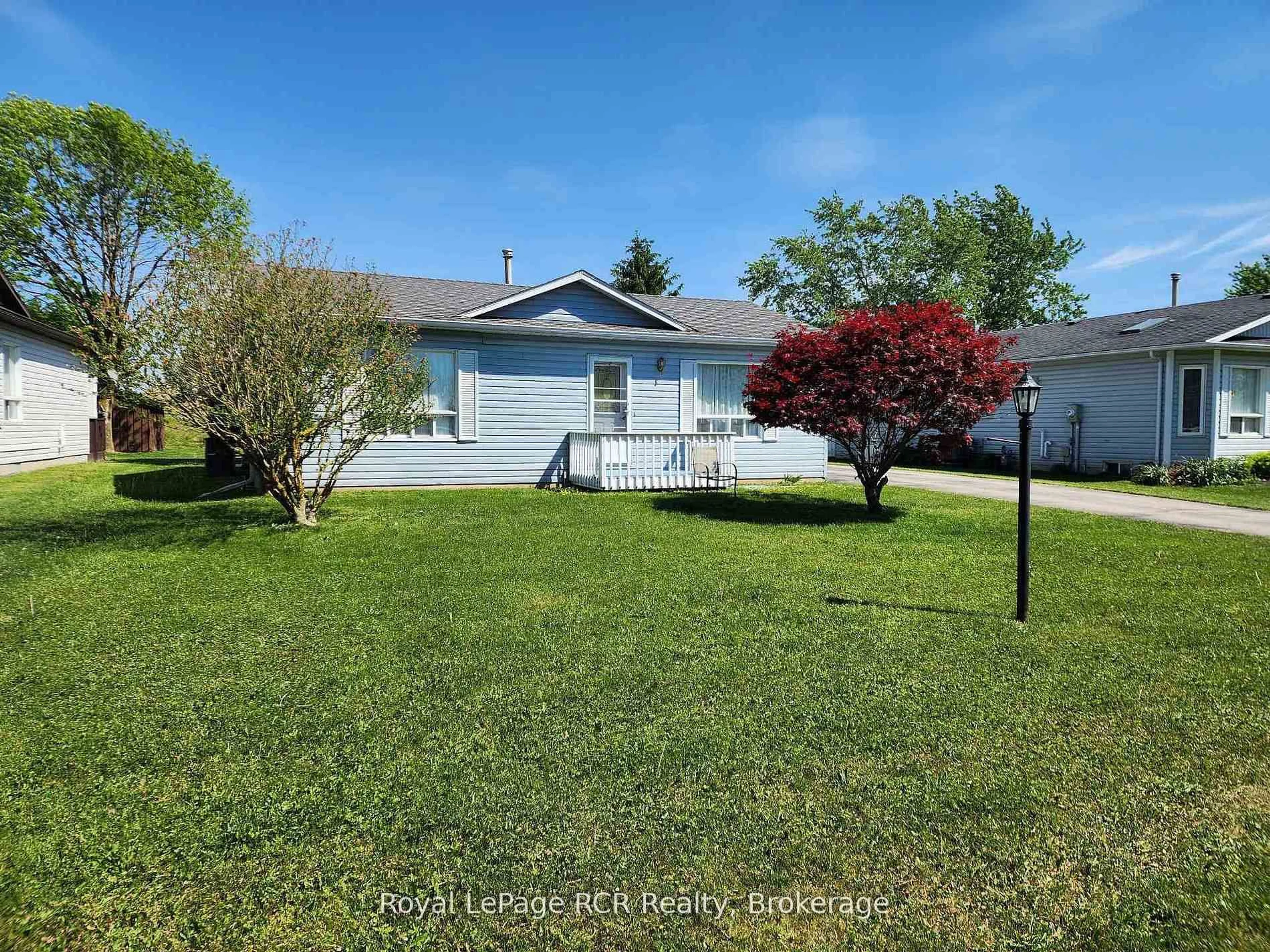 A pic from outside/outdoor area/front of a property/back of a property/a pic from drone, street for 103 Meadowview Lane, North Perth Ontario N4W 3G8