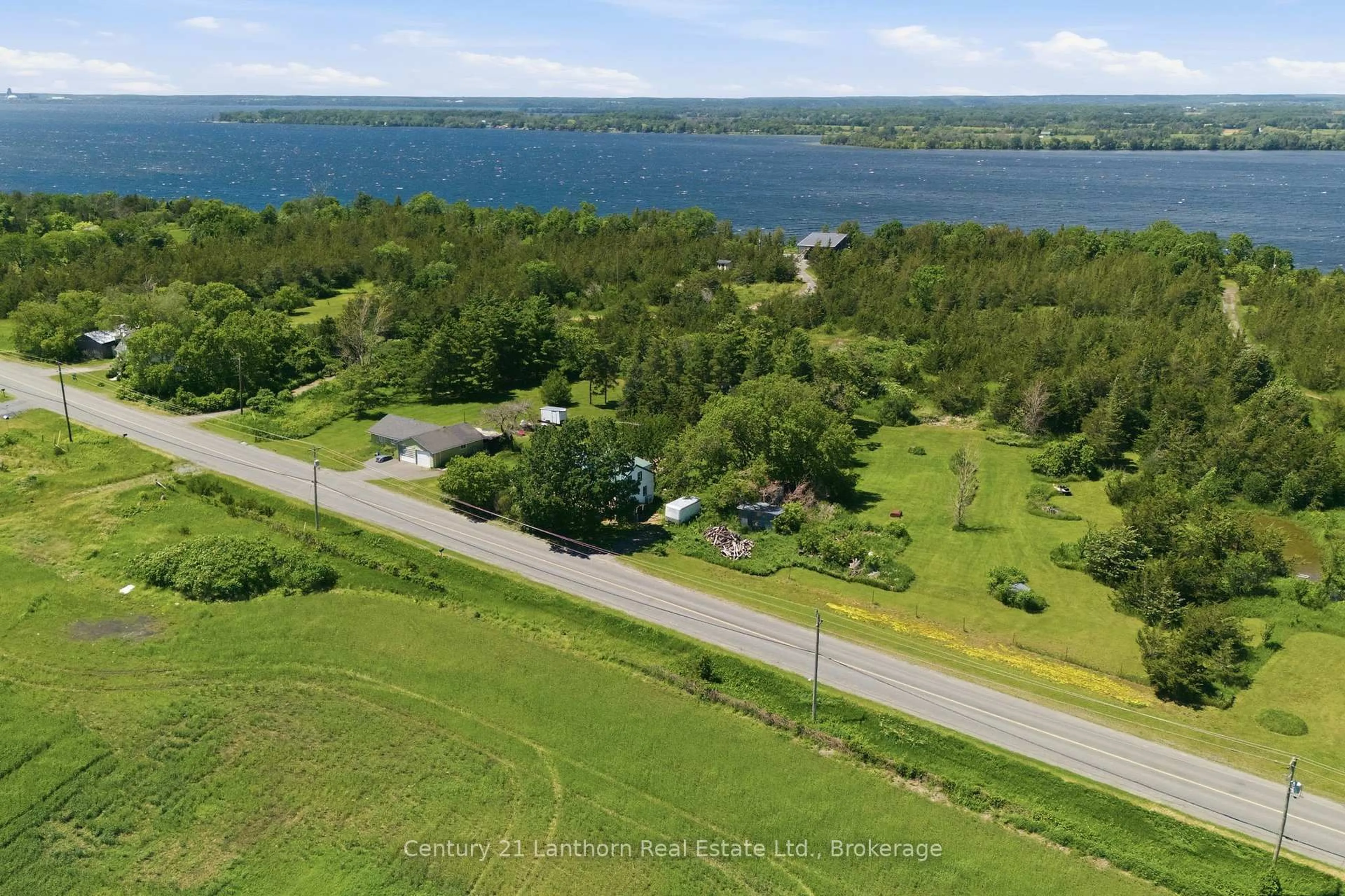 A pic from outside/outdoor area/front of a property/back of a property/a pic from drone, water/lake/river/ocean view for 1247 County 7 Rd, Prince Edward County Ontario K0K 2T0