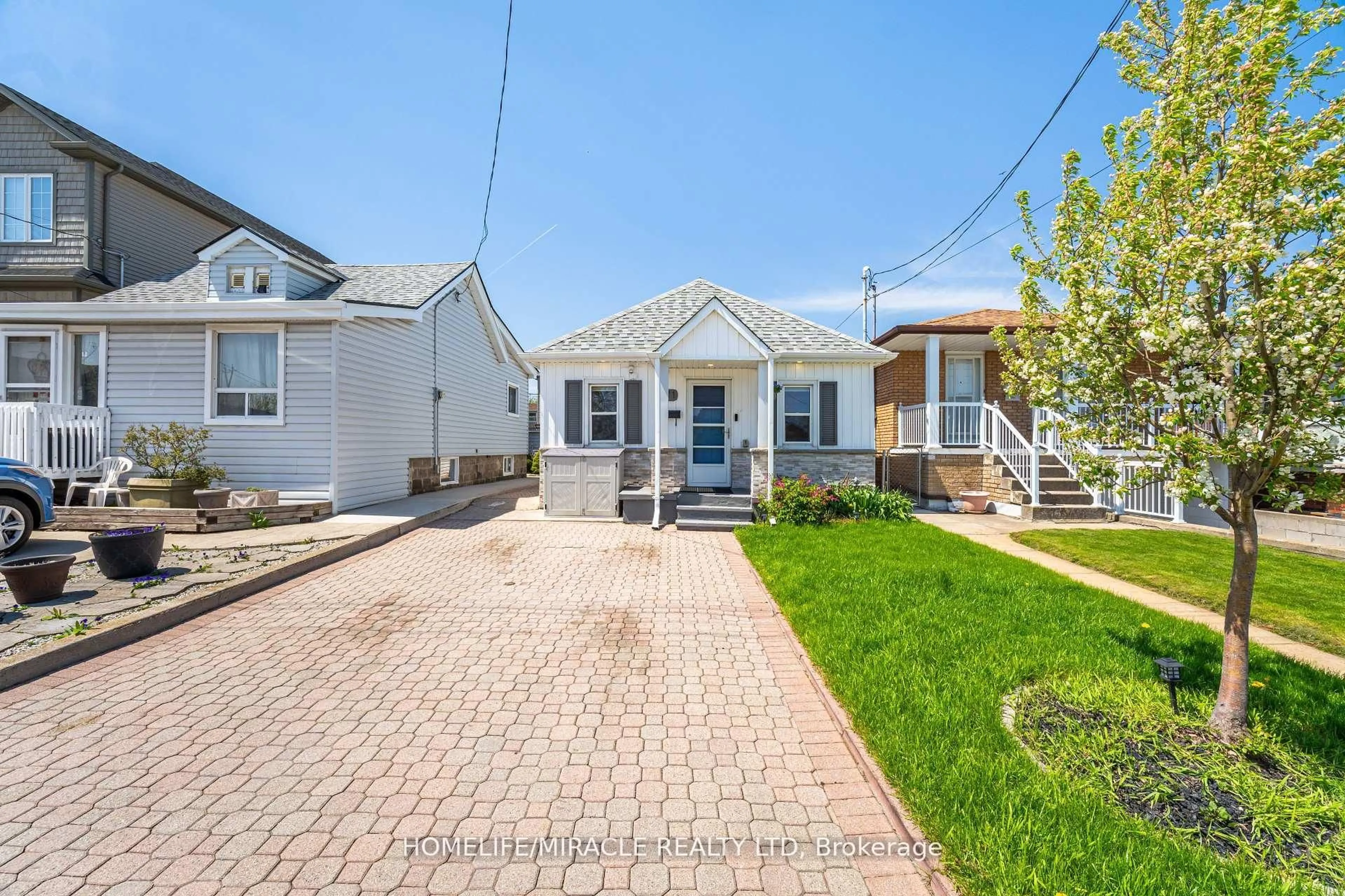 Home with vinyl exterior material, street for 71 Beland Ave, Hamilton Ontario L8H 6C2