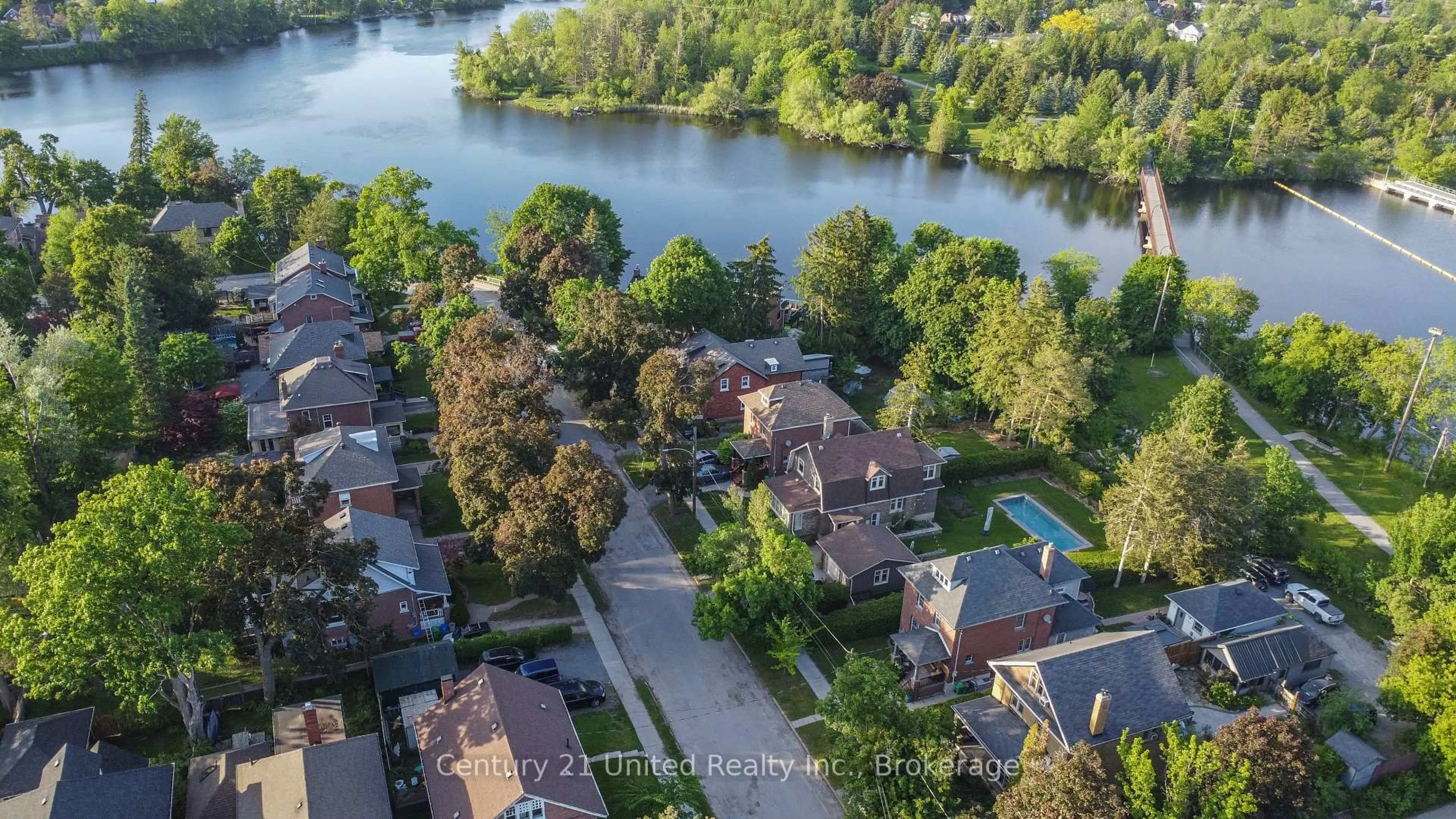 A pic from outside/outdoor area/front of a property/back of a property/a pic from drone, water/lake/river/ocean view for 566 Waterford St, Peterborough Ontario K9H 3K6